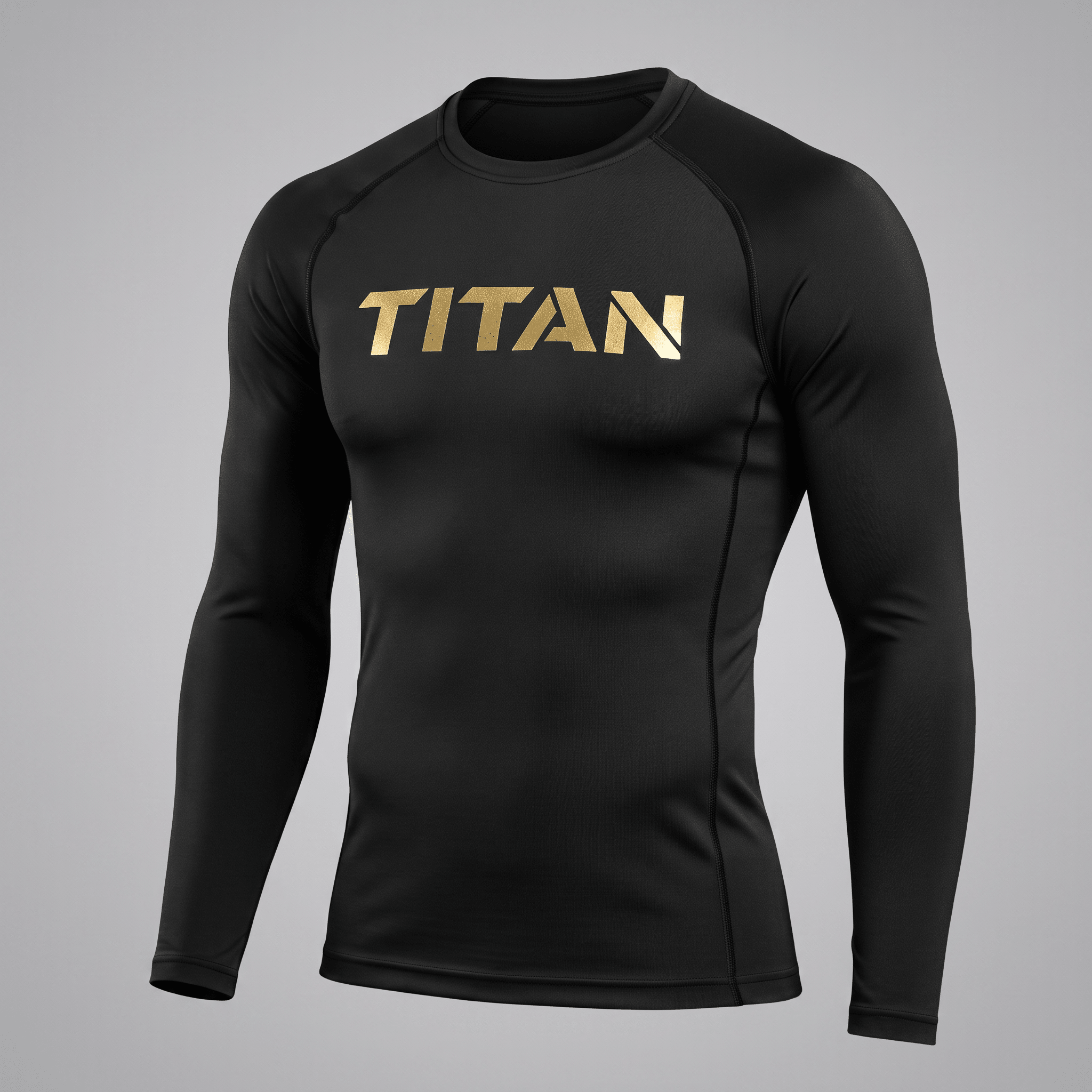 Black long-sleeve athletic rash guard with gold TITAN logo on chest.