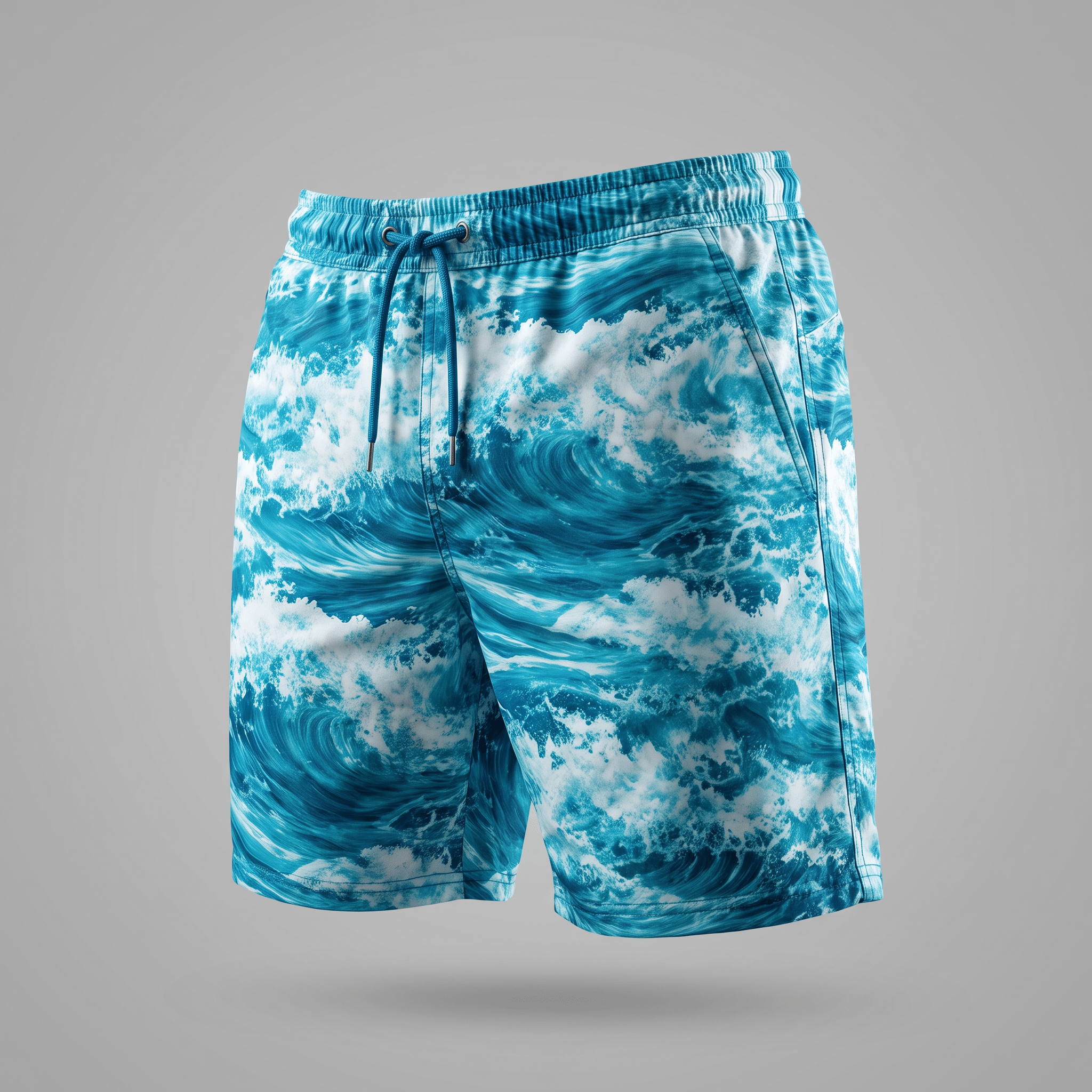 Blue and white ocean wave print swim trunks with an elastic drawstring waist.