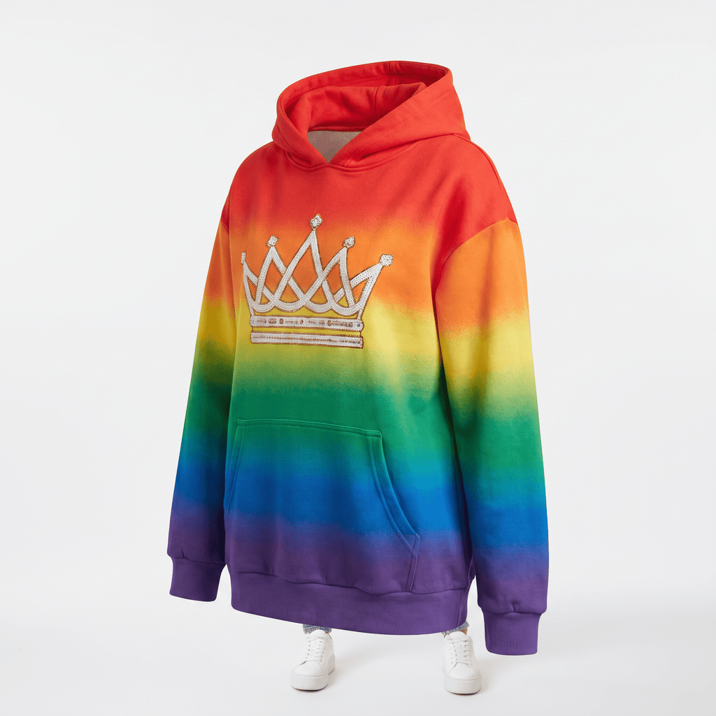 Rainbow ombre hoodie with a white jeweled crown graphic on the chest, featuring a front pocket.