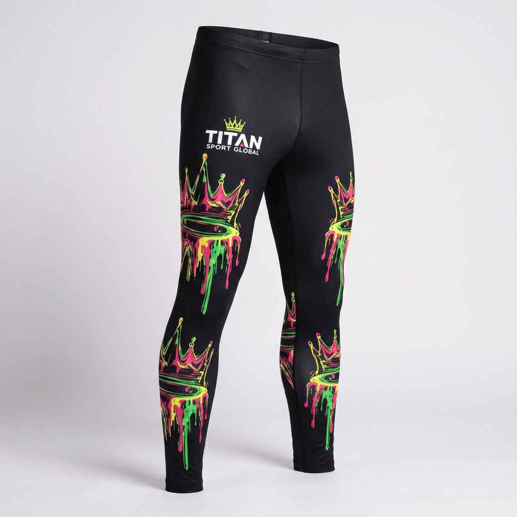 Black athletic leggings featuring neon pink and green dripping crown graphics and Titan Sport Global logo.