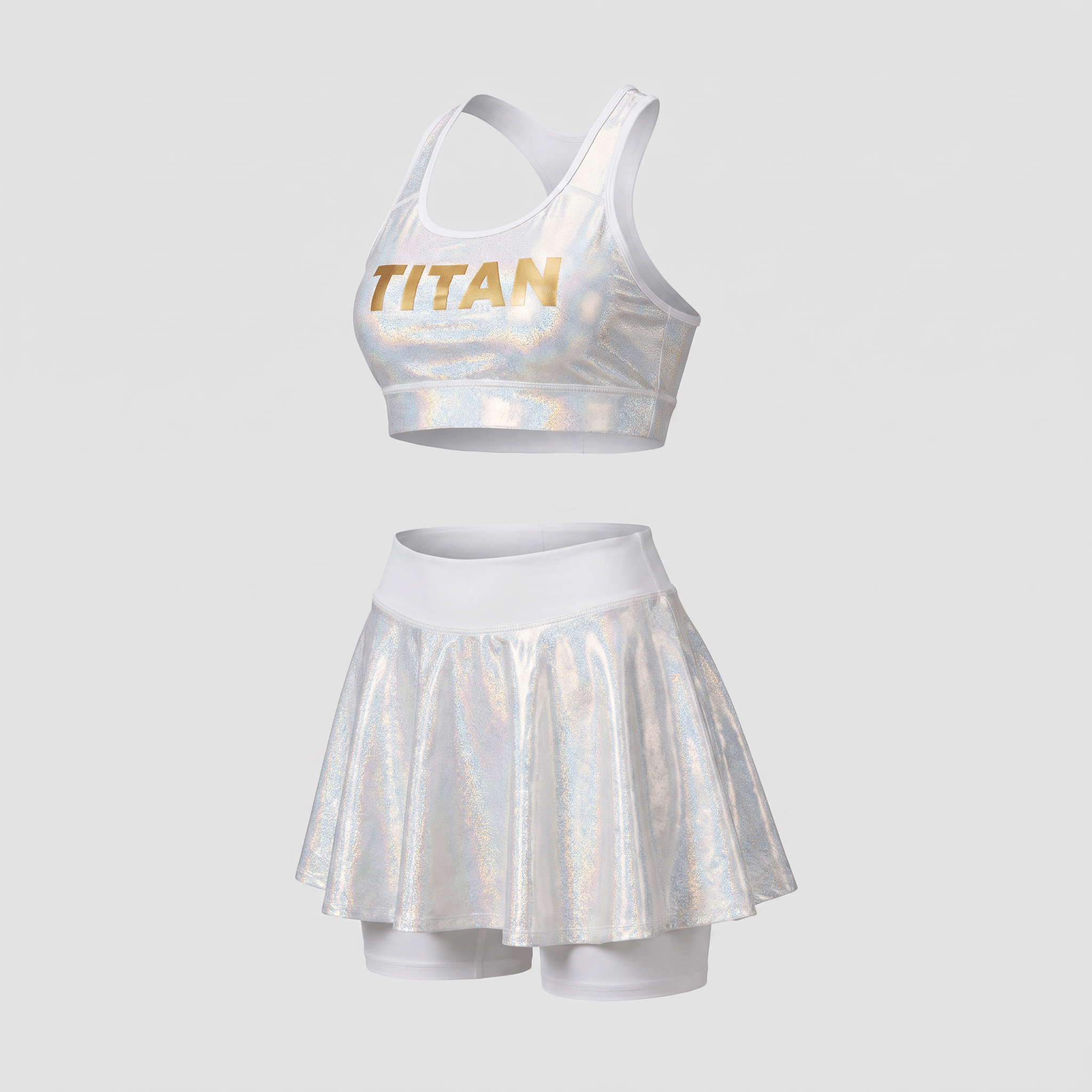 White metallic sports bra and skirt set with Titan logo on front.