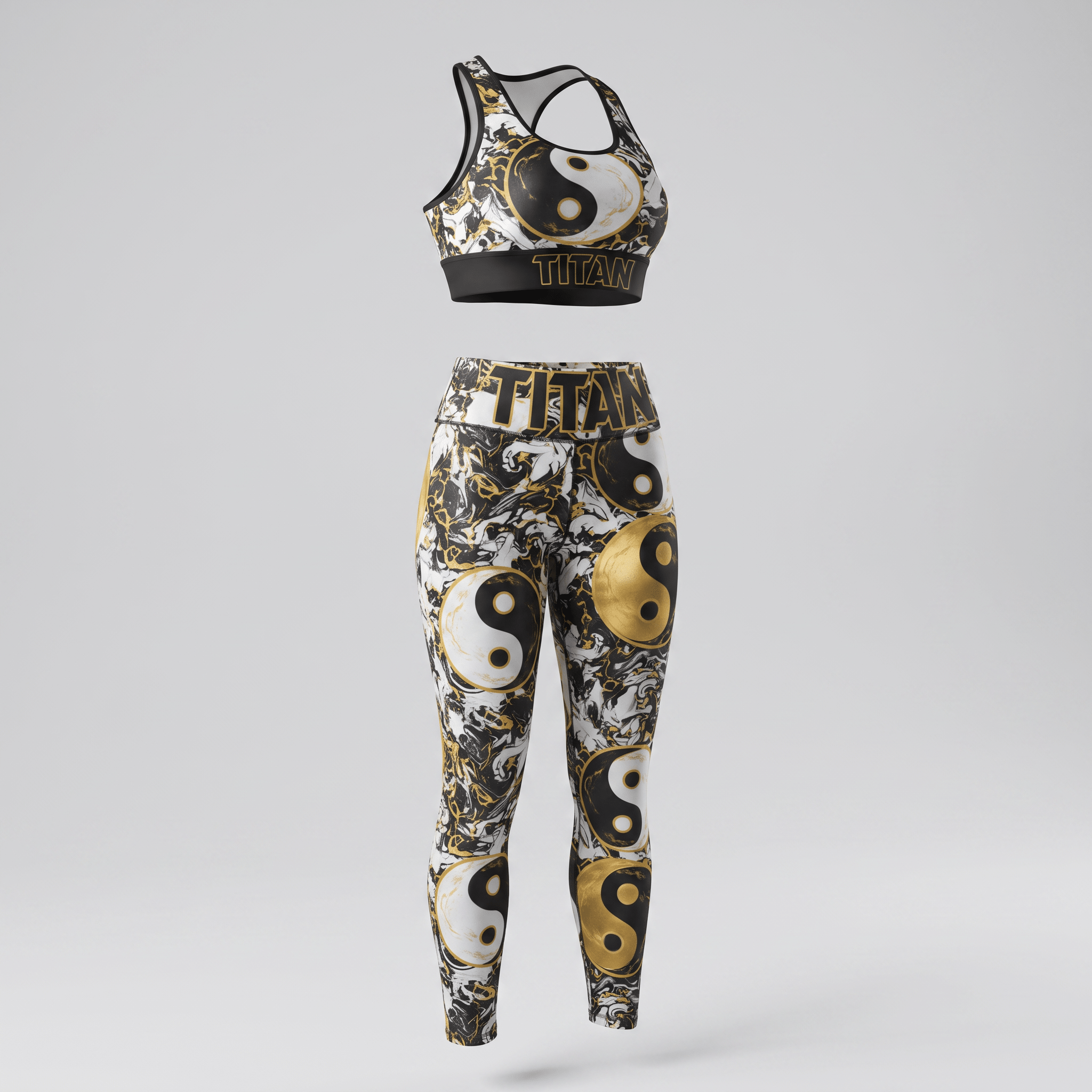 Titan black, white, and gold yin yang print sports bra and leggings set.