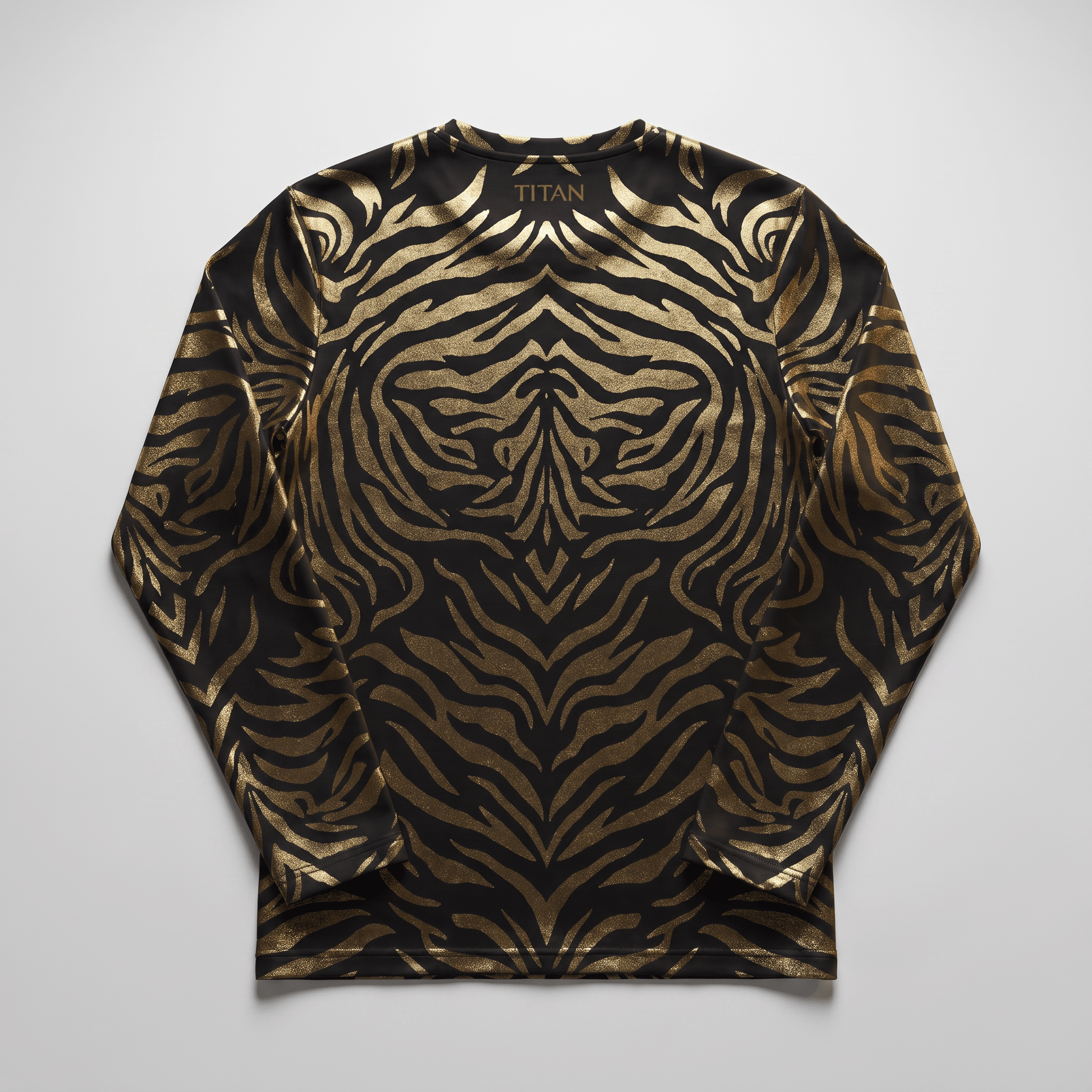 Back of black long-sleeve athletic shirt featuring metallic gold tiger stripe print and Titan branding.