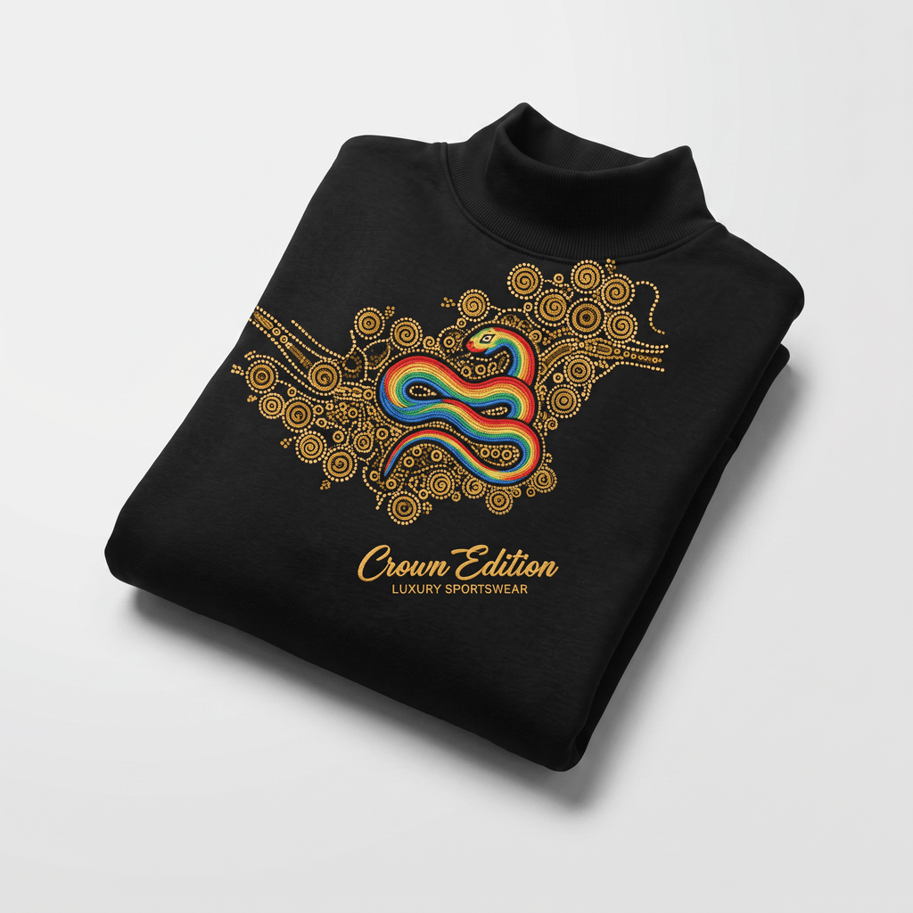 Folded black mock neck sweatshirt with a colorful rainbow snake and gold dot art print.
