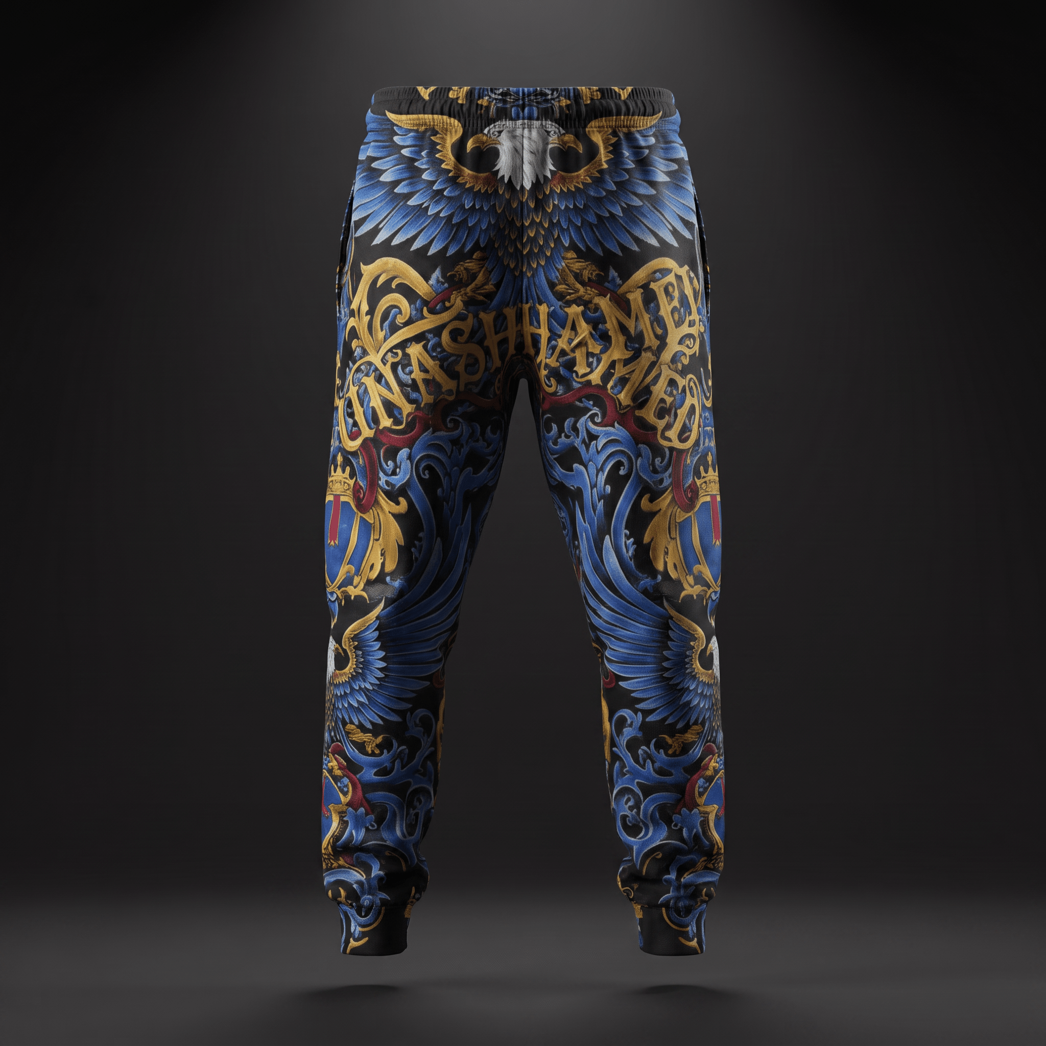 Black sweatpants with blue and gold baroque eagle graphics and Unashamed text.