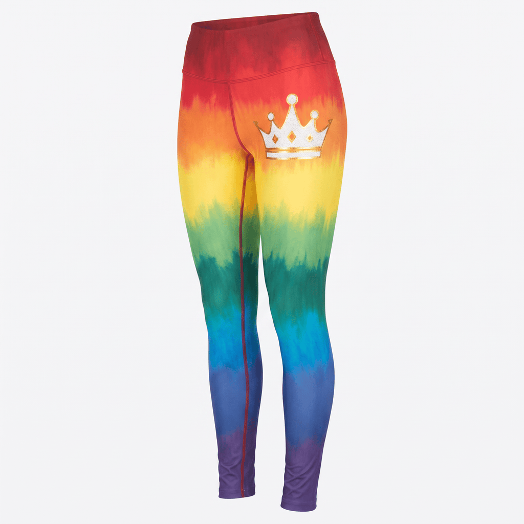 High-waisted rainbow tie-dye athletic leggings featuring a gold crown graphic on the left hip.