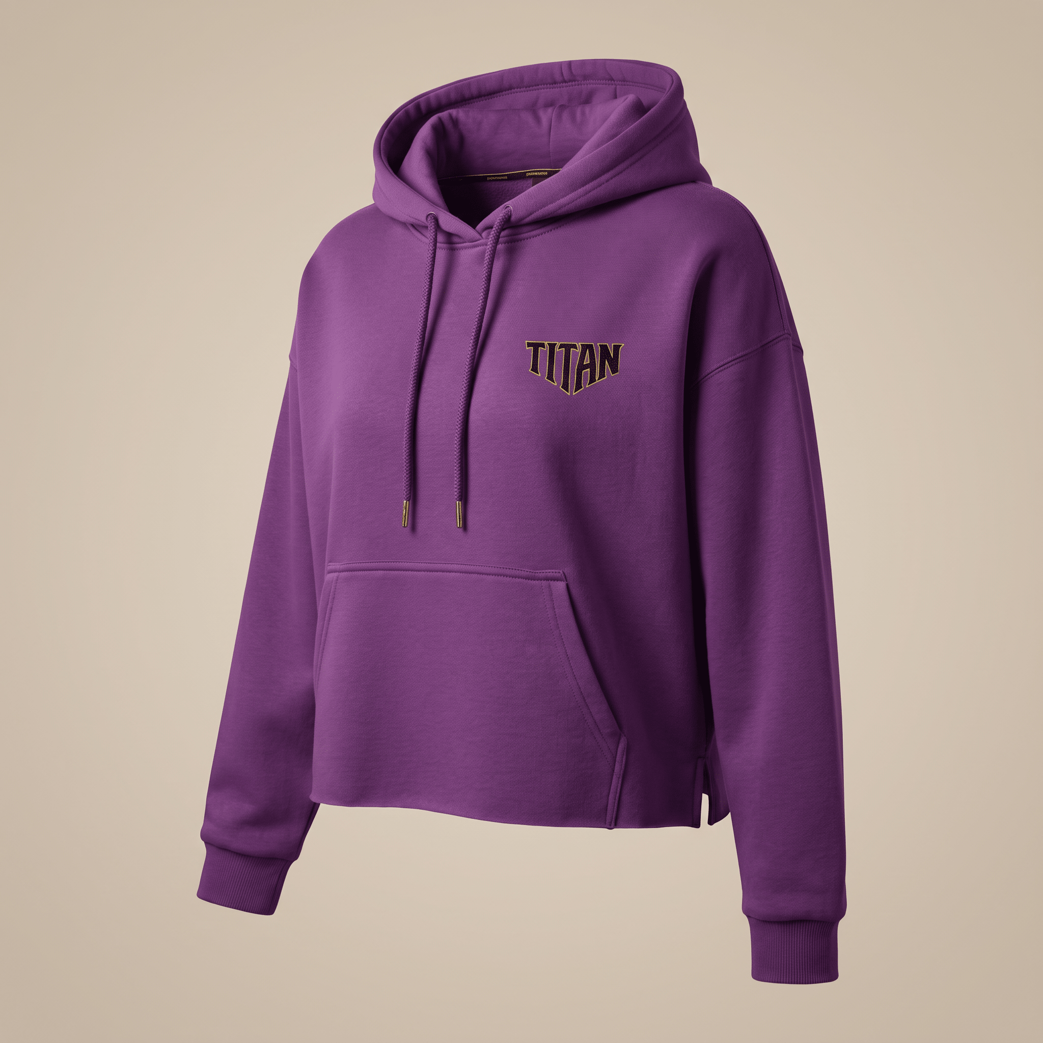 Purple cropped hoodie with matching drawstrings, front pocket, and embroidered black and gold Titan logo on chest.