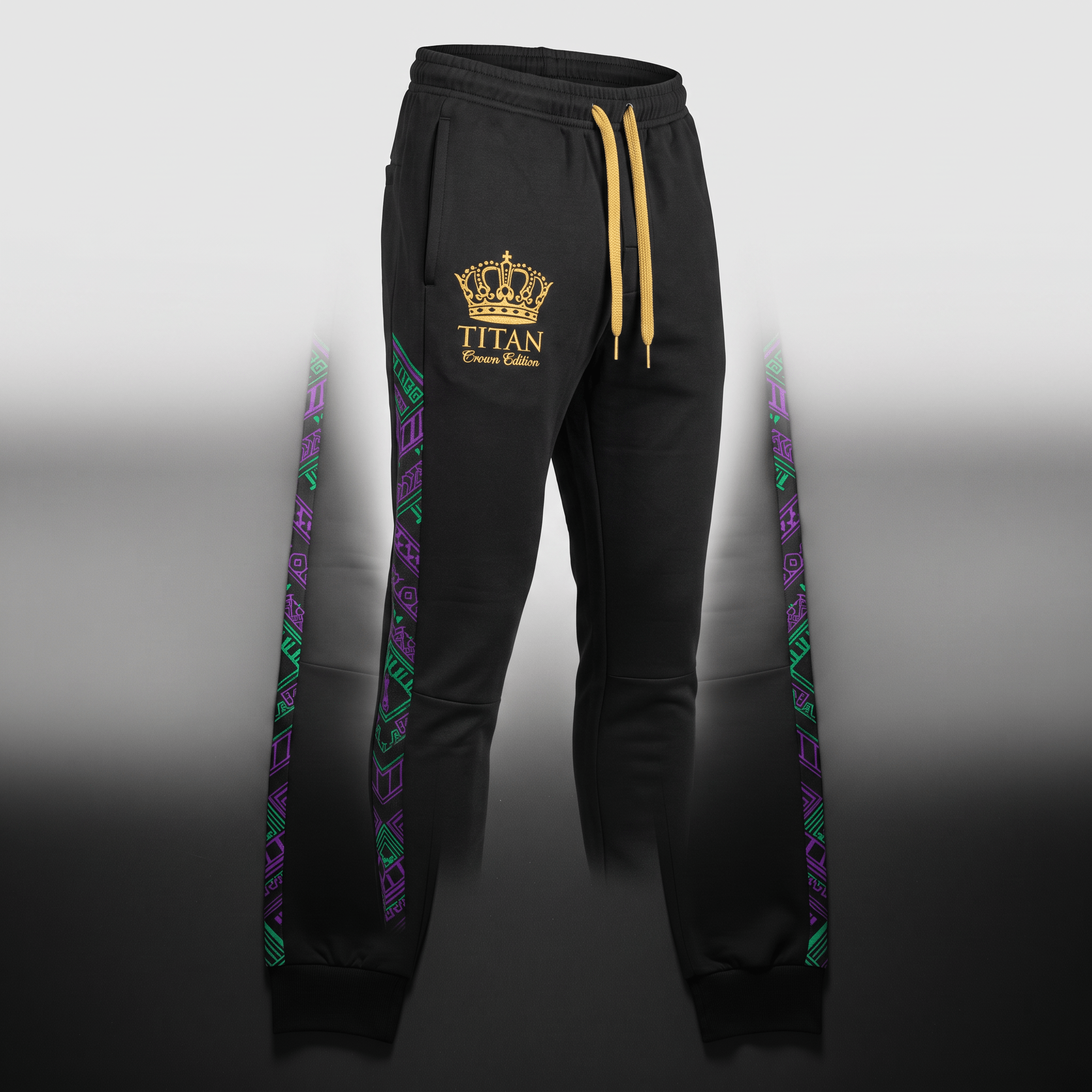 Black Titan Crown Edition joggers with gold drawstrings, gold crown logo, and purple and green side panels.