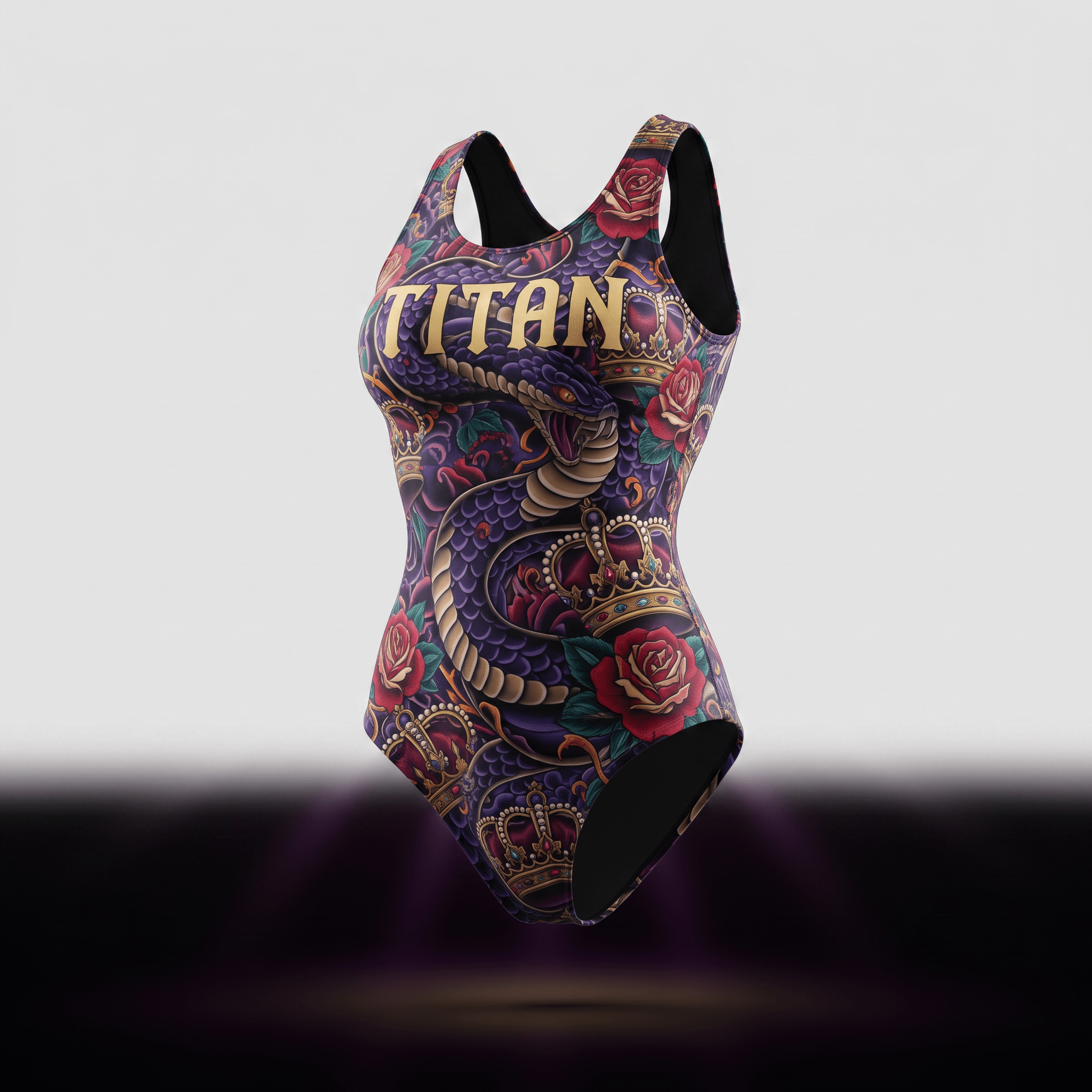 Titan one-piece swimsuit featuring purple snake, red rose, and gold crown tattoo print on dark purple fabric.