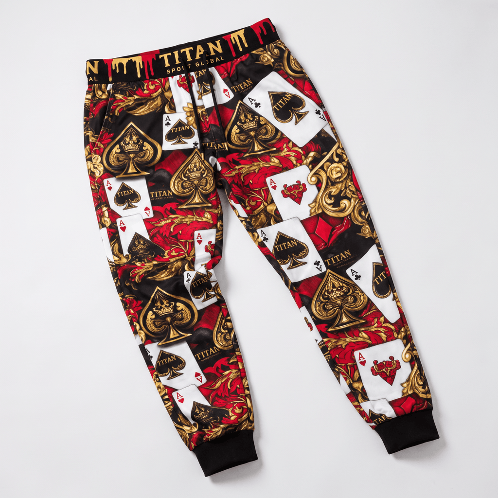 Titan black and red jogger pants featuring a playing card, ace, and gold baroque print.