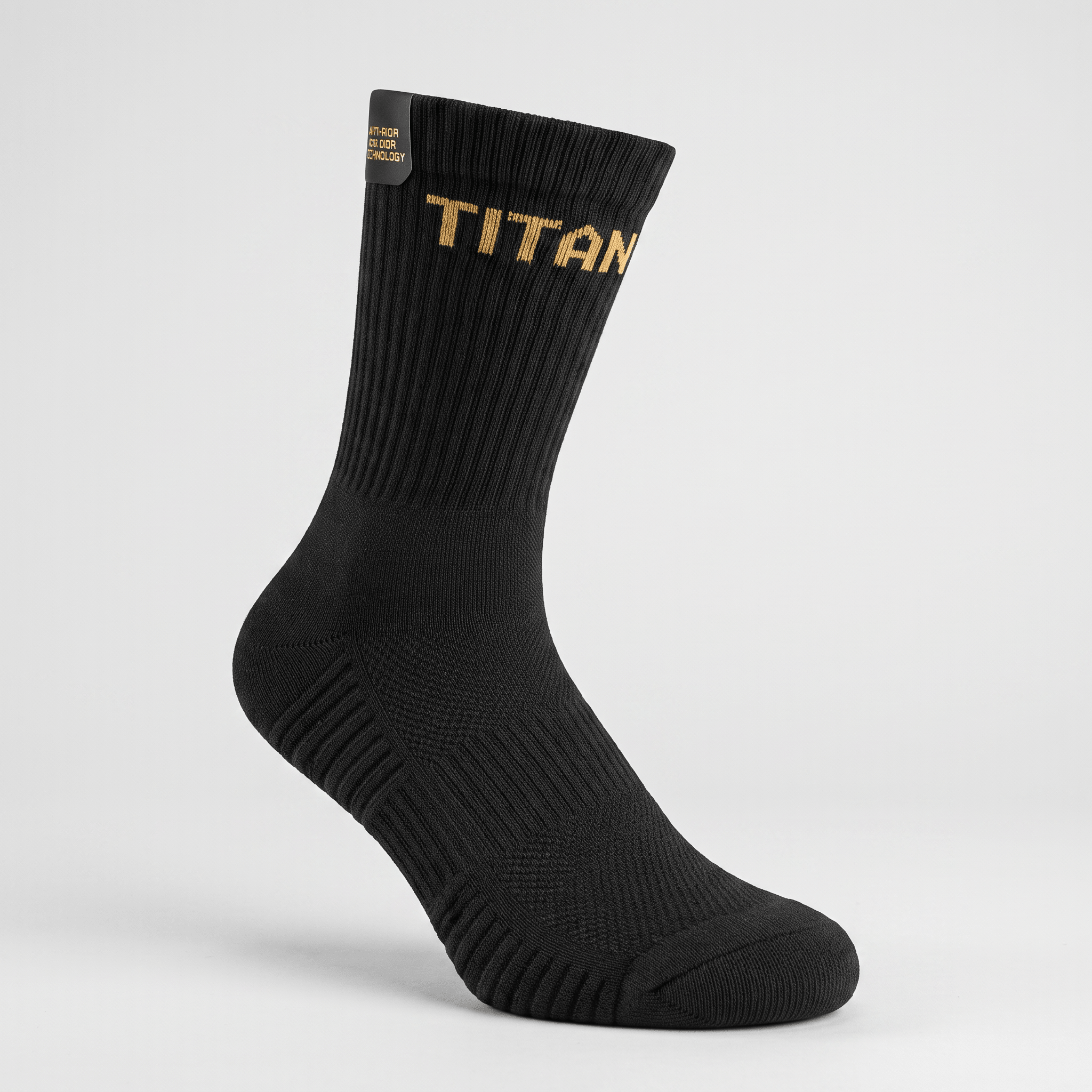 Black crew sock with gold Titan branding and ribbed ankle against a light background.