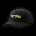 Black TITAN moisture-wicking athletic cap with a textured fabric finish and gold embroidered logo on front.