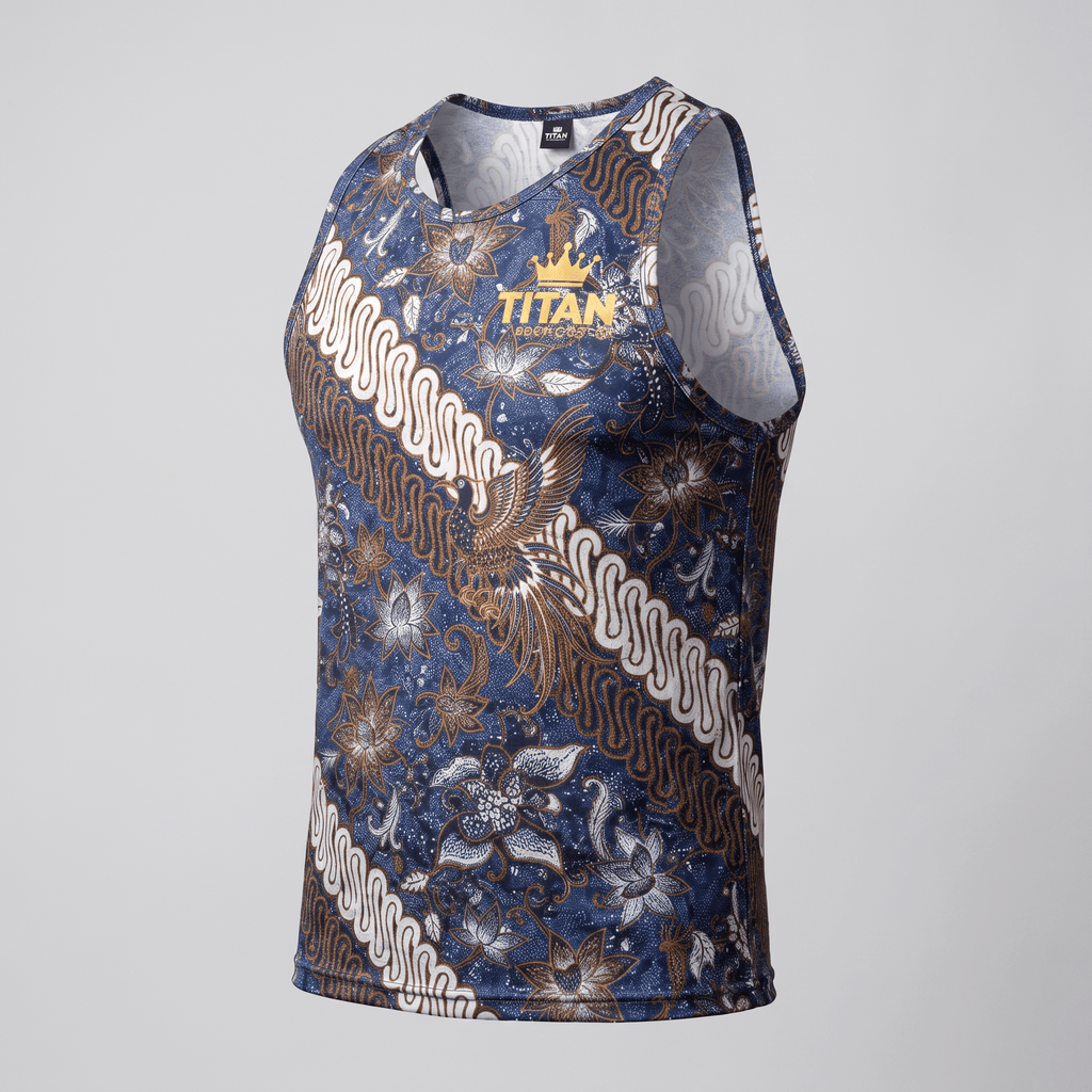 Blue athletic tank top featuring a traditional brown and white batik floral pattern with a gold Titan crown logo.