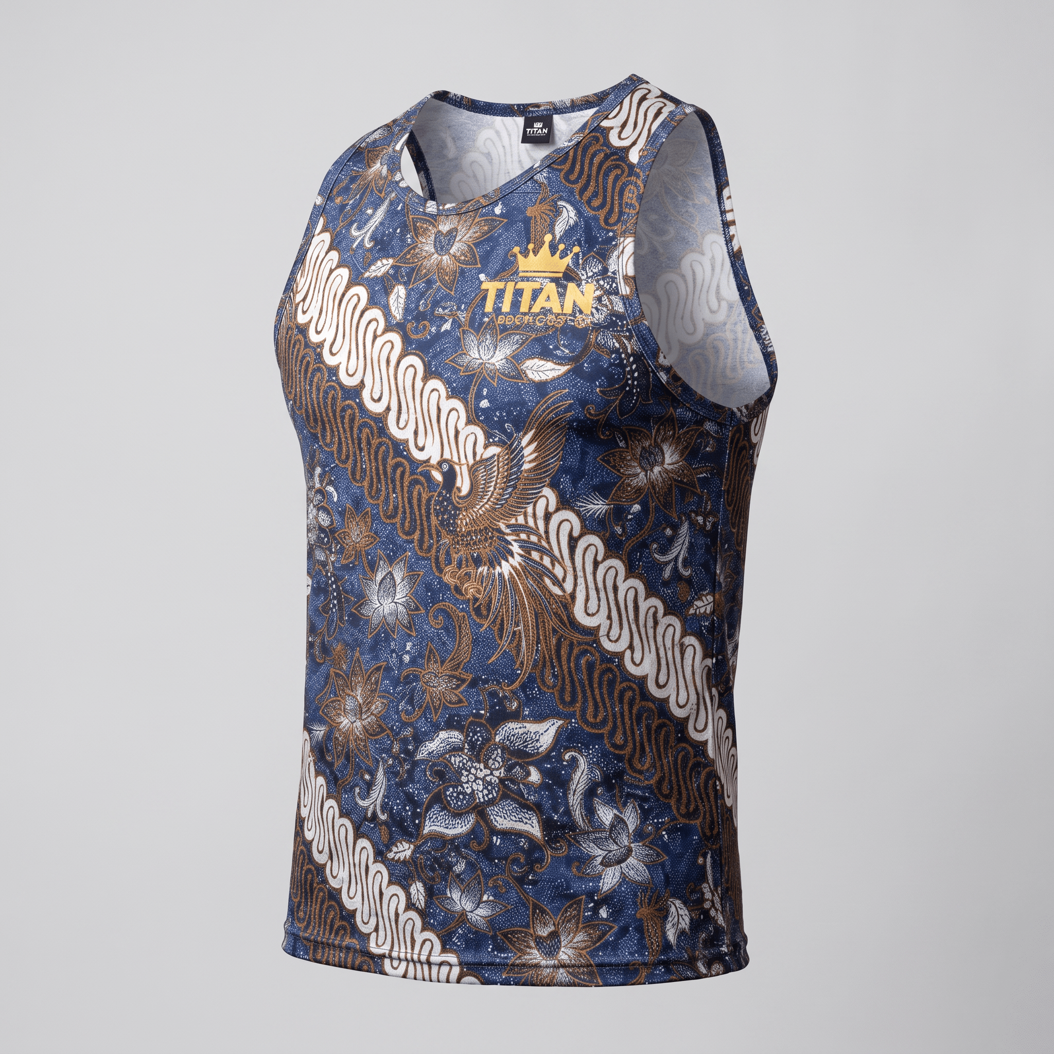 Blue athletic tank top featuring a traditional brown and white batik floral pattern with a gold Titan crown logo.