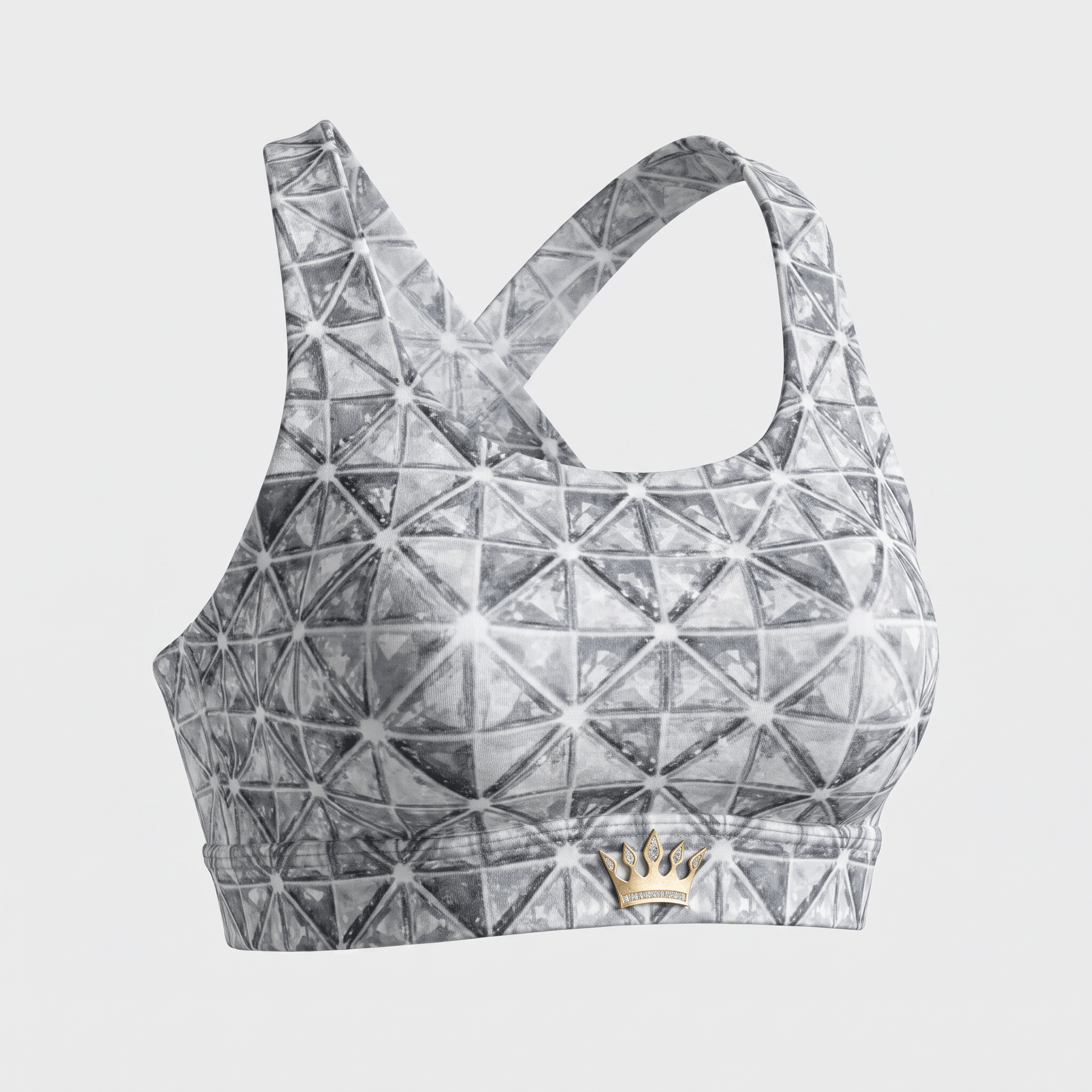 Grey and white geometric triangle print sports bra with a gold crown logo on the underband.