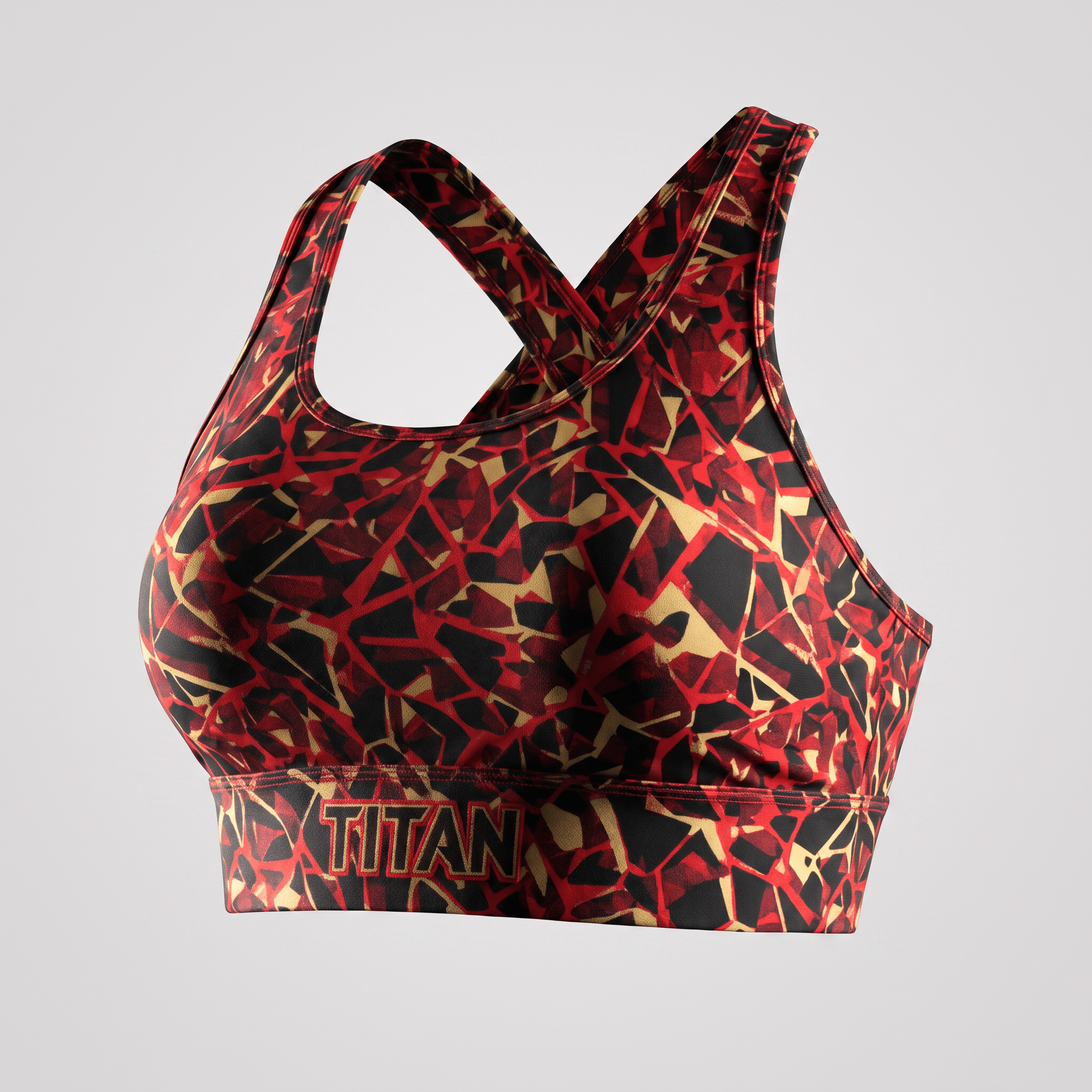 Red and black abstract print sports bra with crisscross straps and Titan logo on the band.
