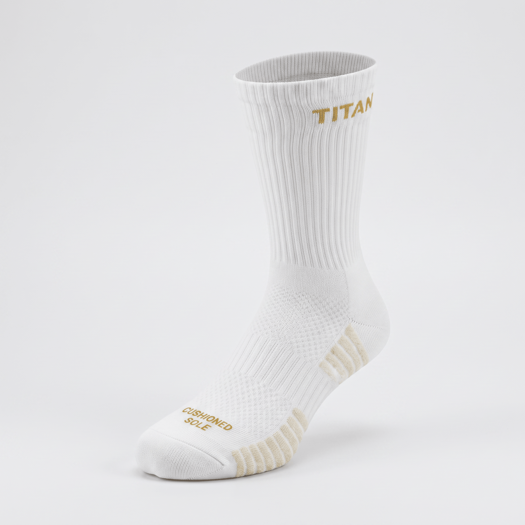 White athletic crew sock with gold Titan logo and cushioned sole against a light background.
