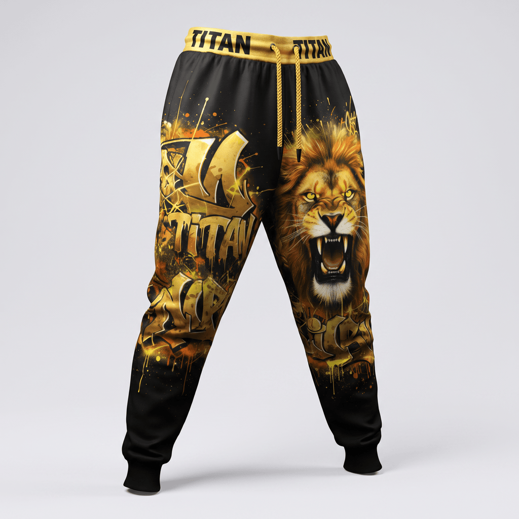 Black joggers featuring gold lion graphic and graffiti print with Titan branded waistband.