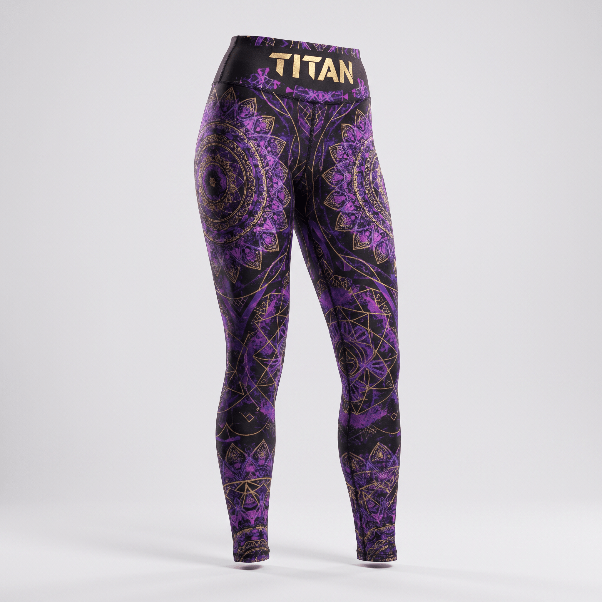 Titan high-waisted leggings in purple and black featuring a gold mandala pattern.
