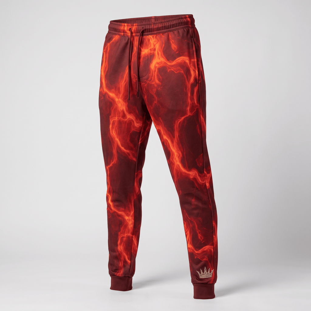 Red and orange fire-patterned athletic sweatpants with a drawstring waist and ribbed cuffs.