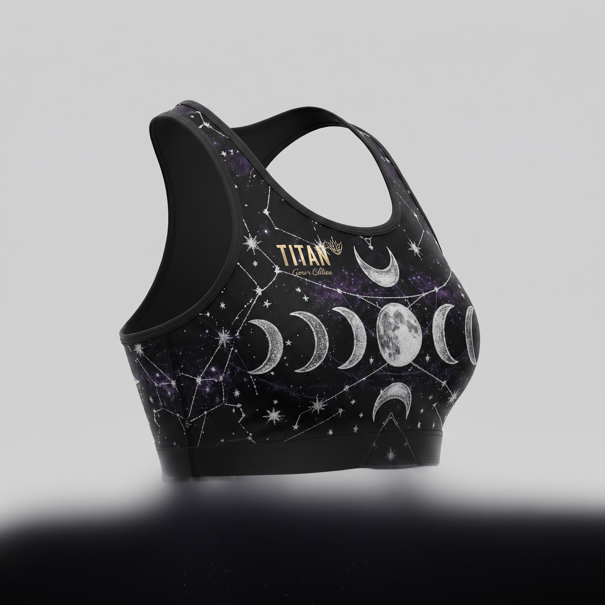 Black athletic sports bra featuring a celestial moon phase and constellation print with gold Titan logo.