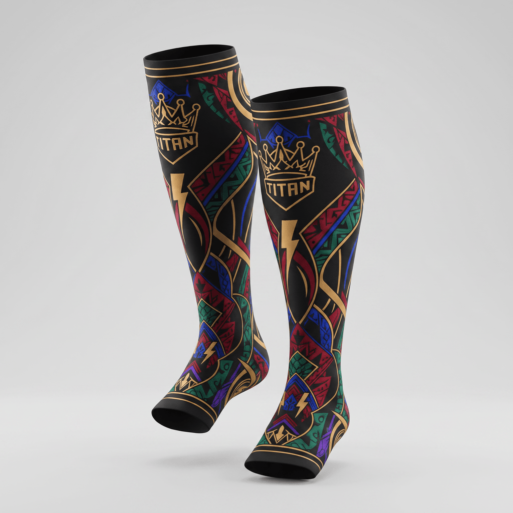 Black compression socks with gold Titan crown logo and colorful geometric tribal patterns.