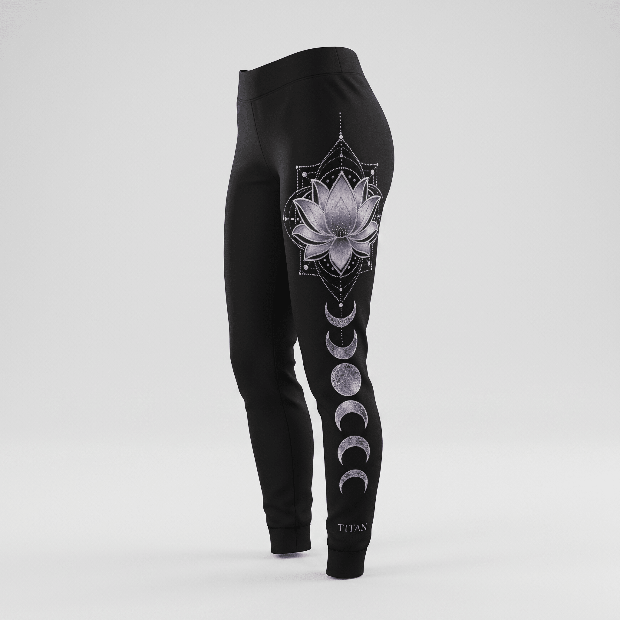Black leggings featuring a silver lotus flower and moon phase print on the leg.