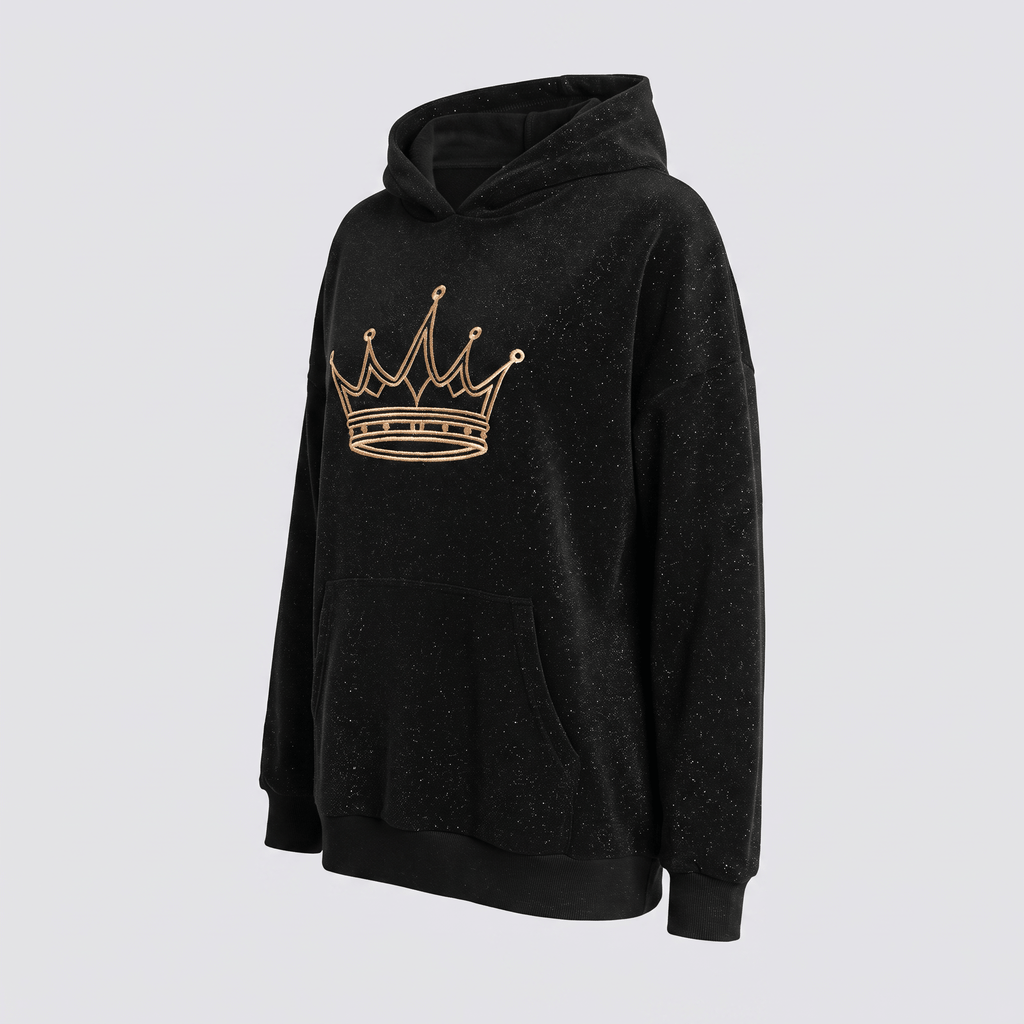 Black hoodie with a gold embroidered crown logo, hood, and front pocket shown on a light background.