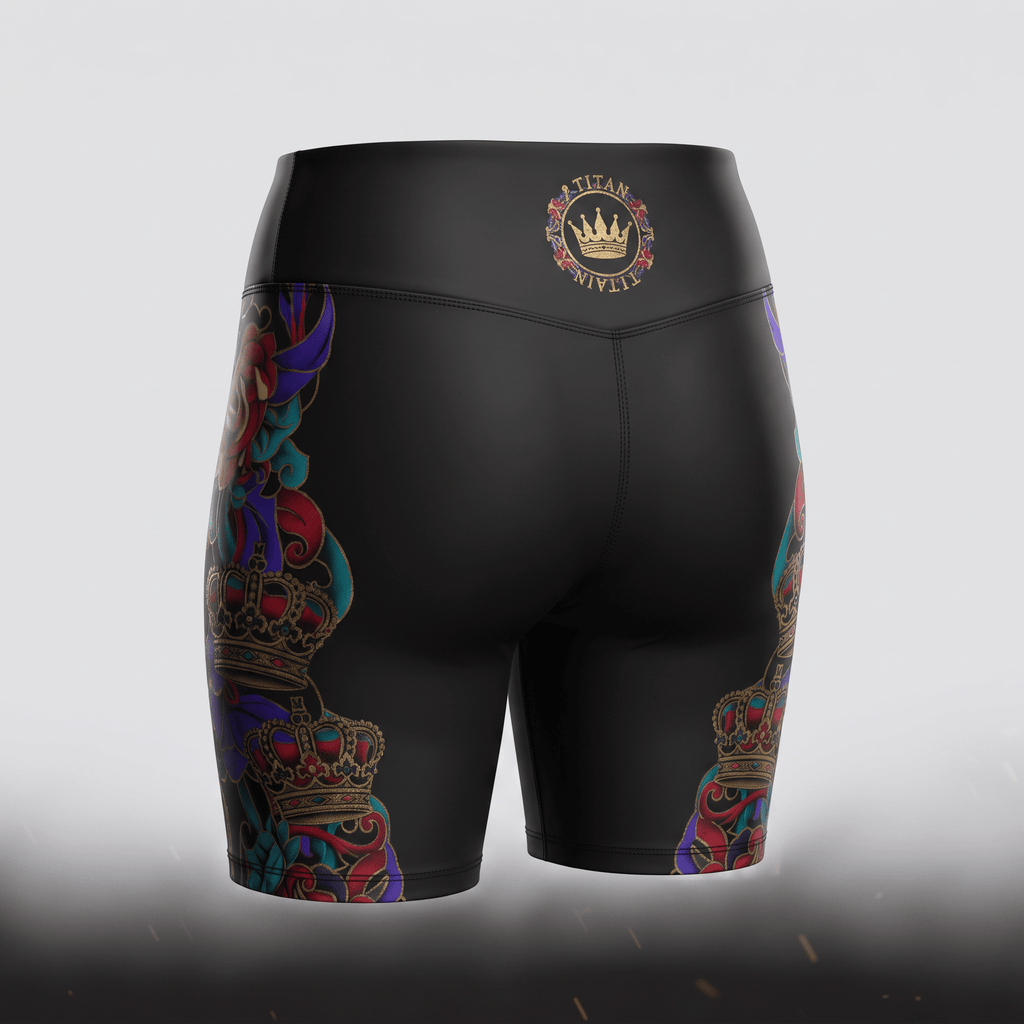 Back view of black athletic biker shorts featuring colorful crown side graphics and a gold Titan logo on the waist.