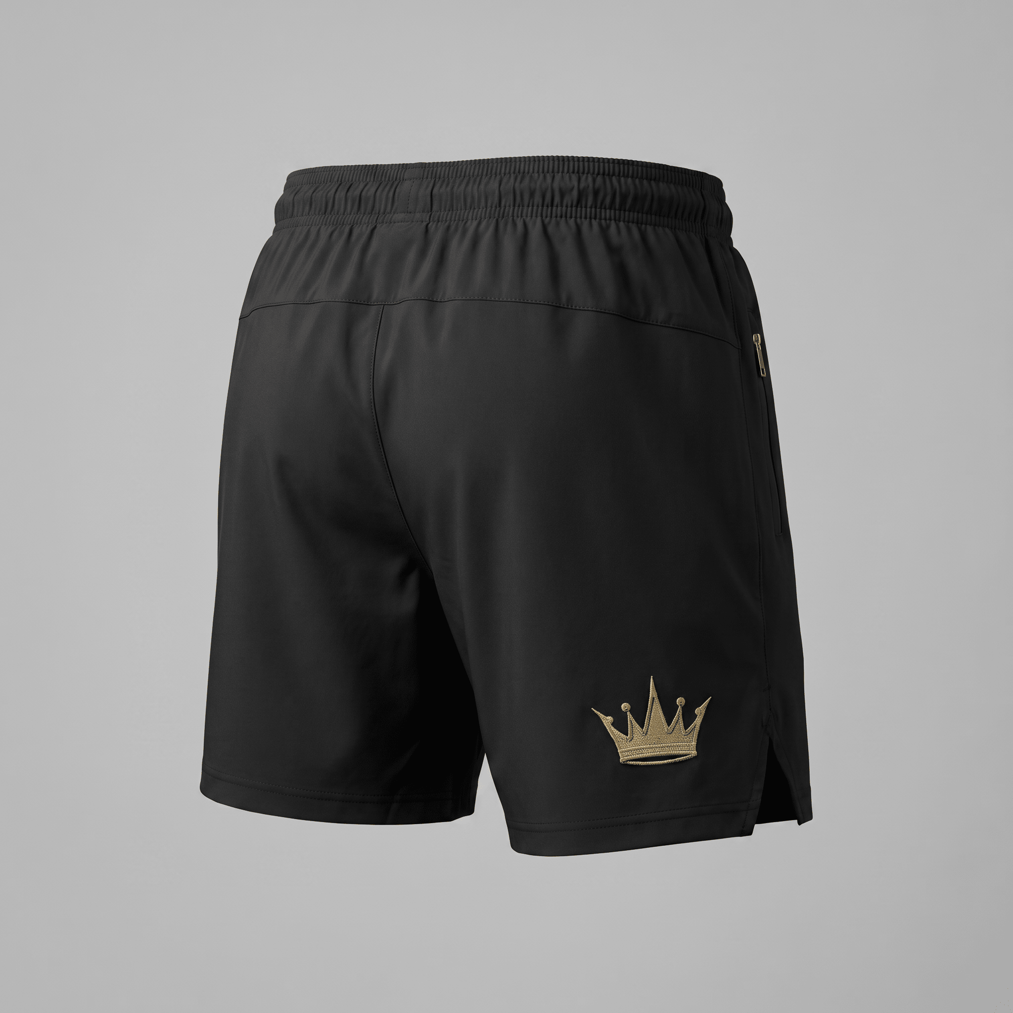 Rear view of black athletic shorts featuring an elastic waistband and a gold crown logo on the right hem.
