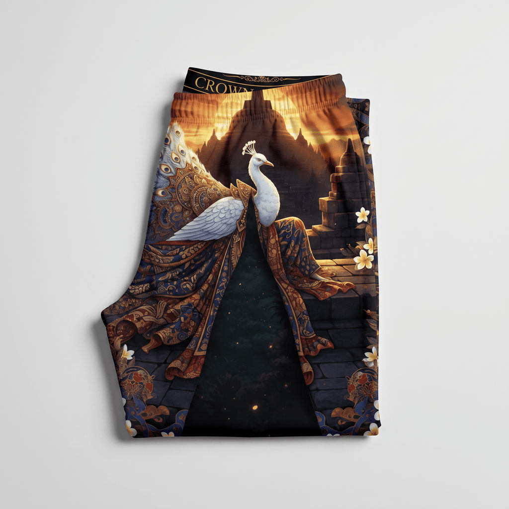 Folded black boxer briefs with an intricate white peacock, pagoda temple, and gold floral print.
