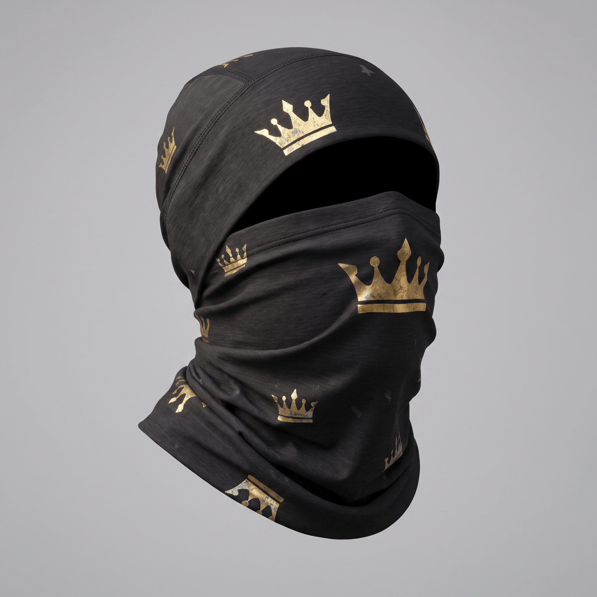 Black balaclava with gold crown pattern, showcasing a sleek style against a neutral gray background.