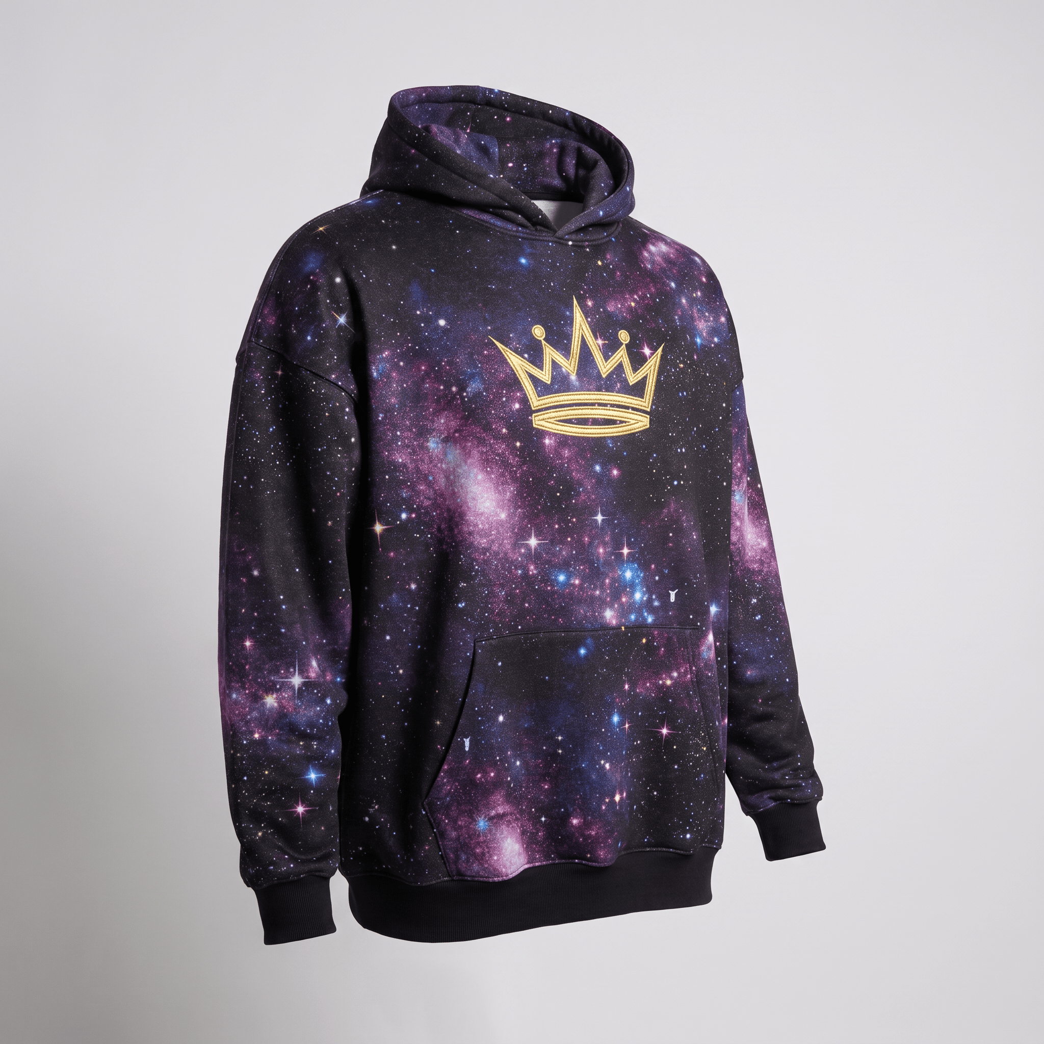 Black galaxy print hoodie featuring a gold crown logo on the chest, pocket, and hood.