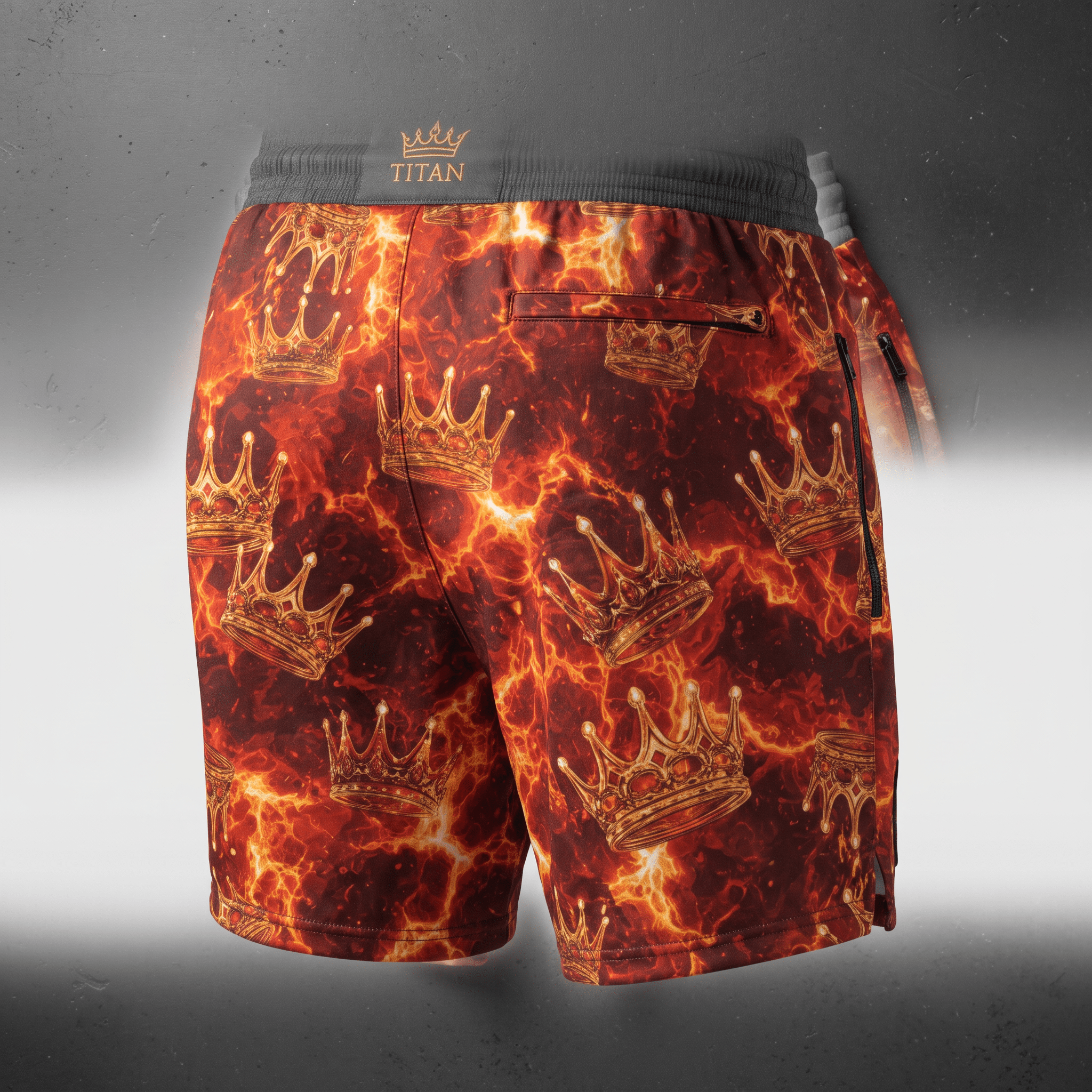 Titan athletic shorts in red and orange flame print with gold crowns and a dark waistband.