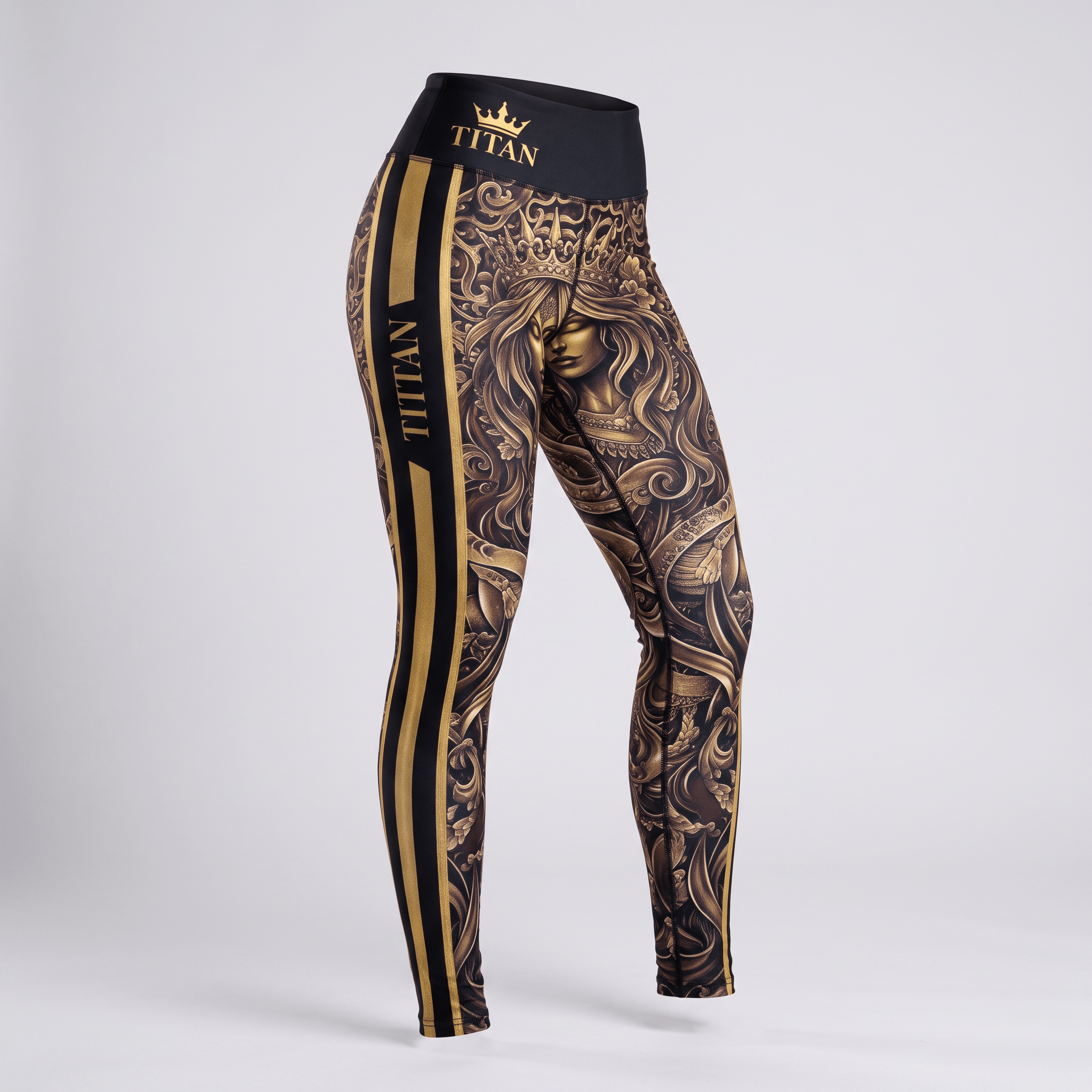 Titan black and gold athletic leggings with baroque floral print and side branding on a white background