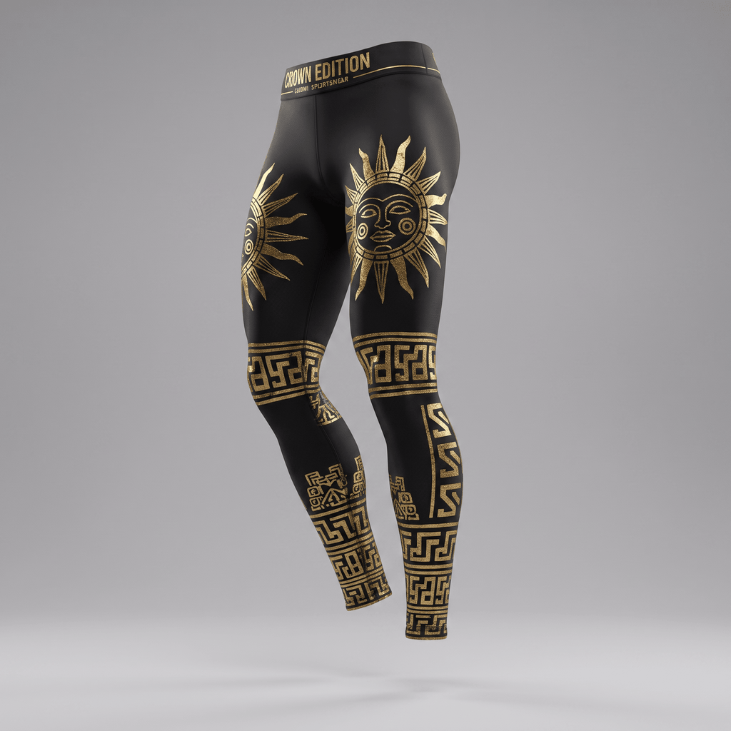 Black athletic leggings featuring gold celestial sun designs and geometric Greek key patterns on legs.