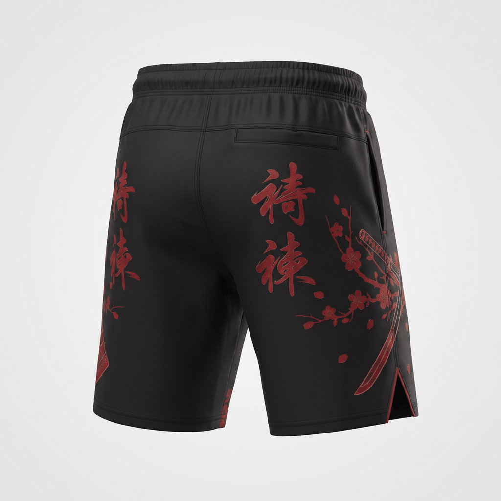 Rear view of black athletic shorts featuring red Japanese text and cherry blossom graphics.