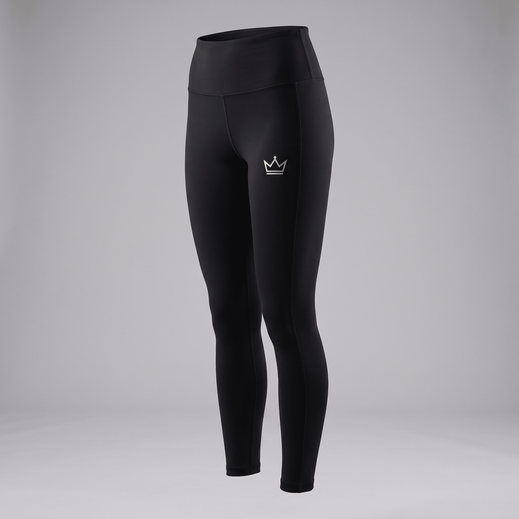 Black high-waisted athletic leggings with a silver crown logo on the left hip shown on a mannequin.
