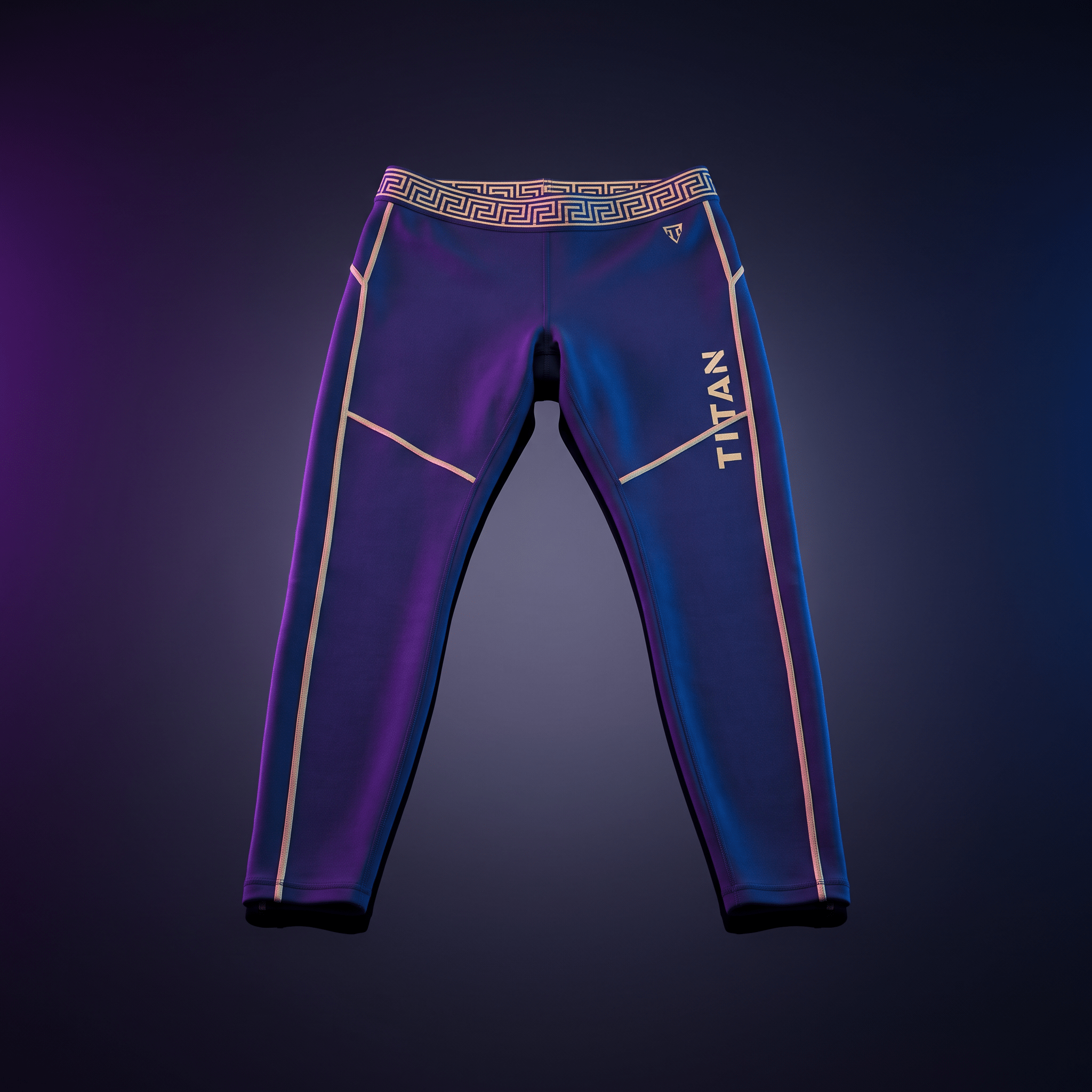 Dark blue athletic leggings with a gold Greek key waistband, gold piping, and a vertical "TITAN" logo on the leg.