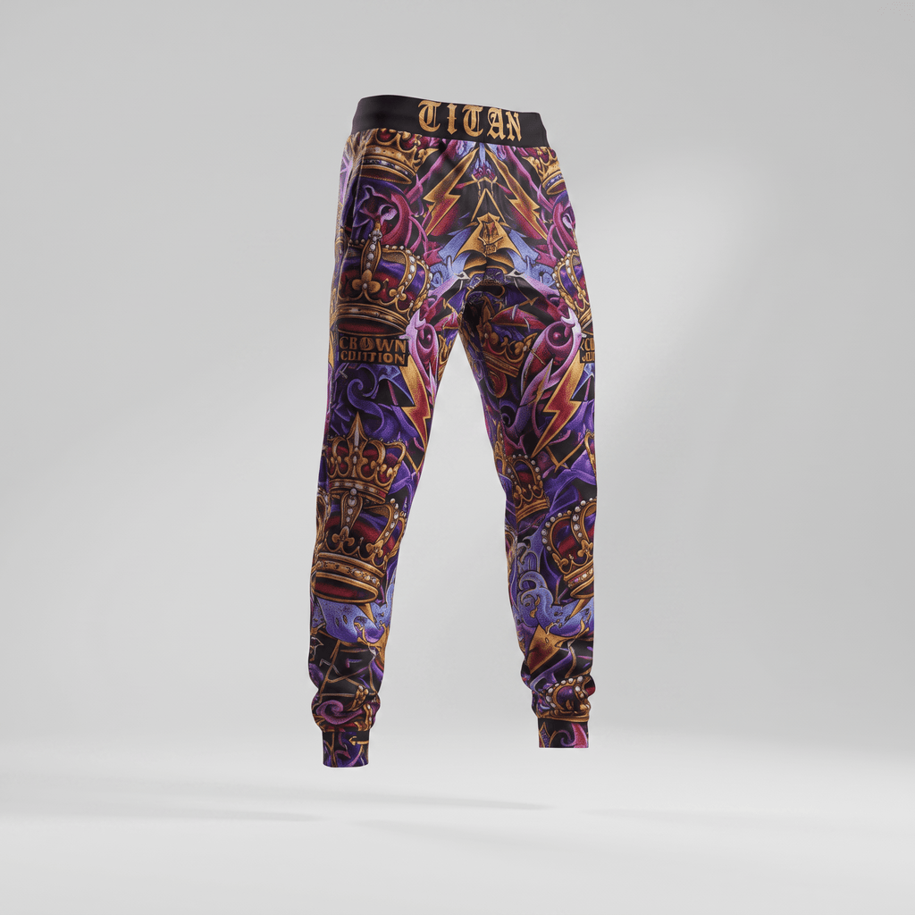 Titan purple and gold crown graphic joggers with black elastic waistband against a grey background.