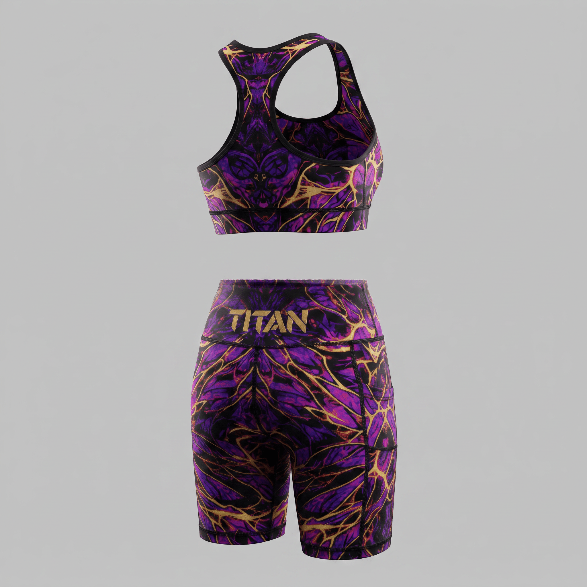 Rear view of a matching purple and gold abstract print sports bra and biker shorts set with Titan branding.