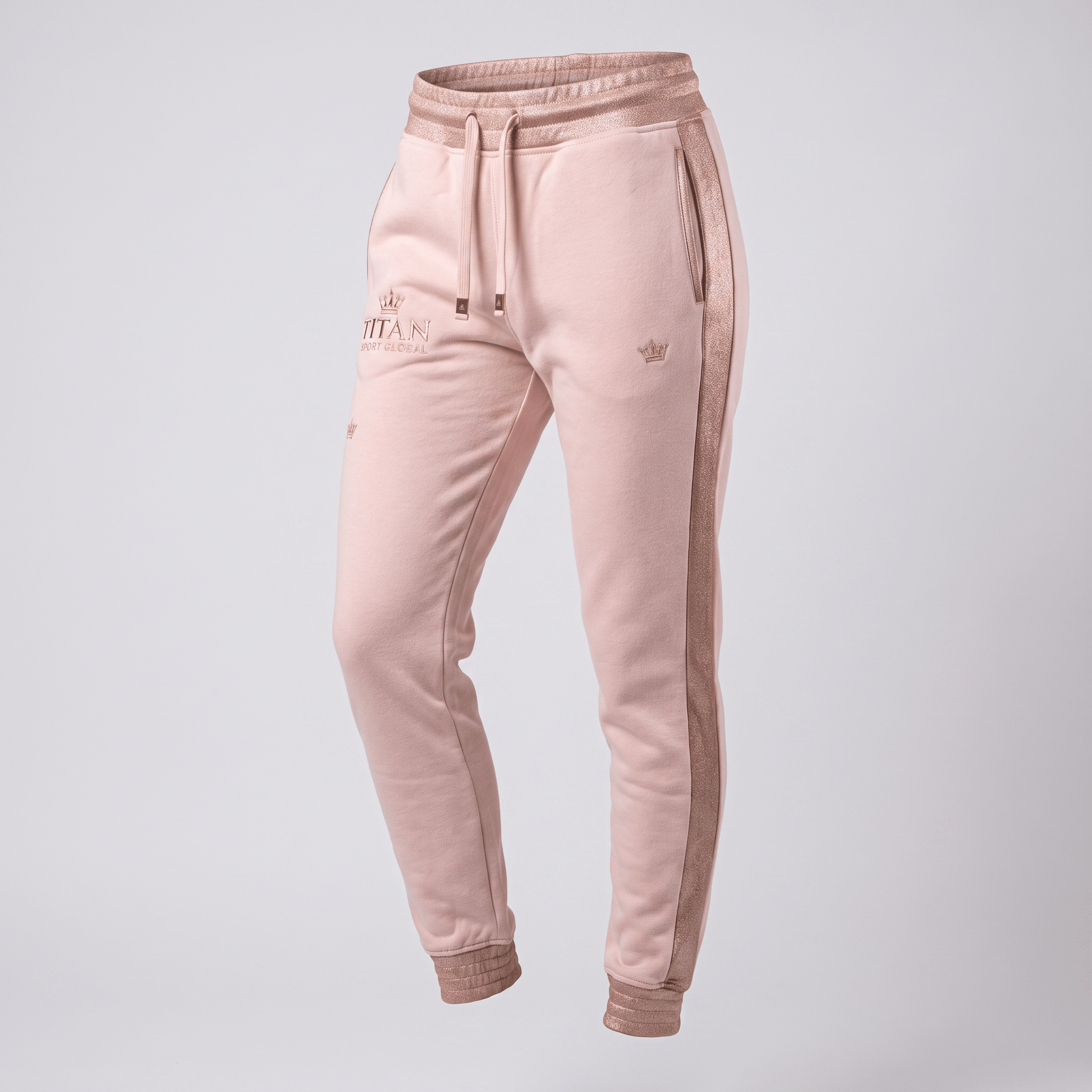 Pink women's joggers with metallic rose gold side stripes, cuffs, and a matching drawstring waistband.