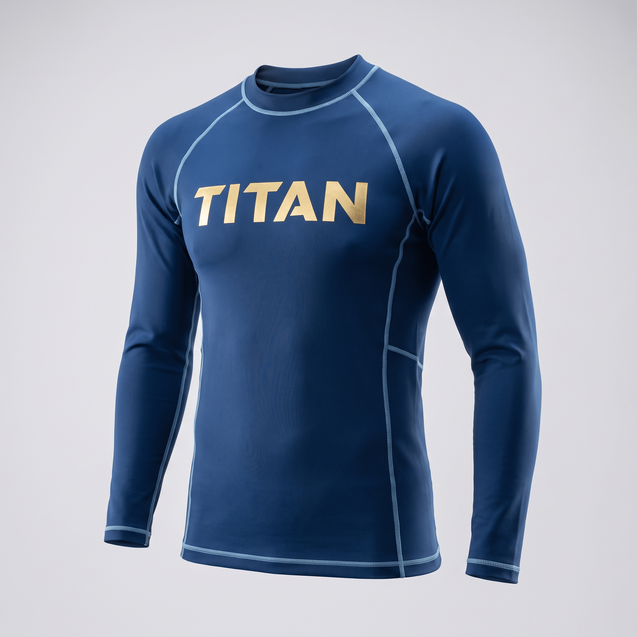 Blue long-sleeve rash guard with gold Titan logo and light blue contrast stitching on light gray background.
