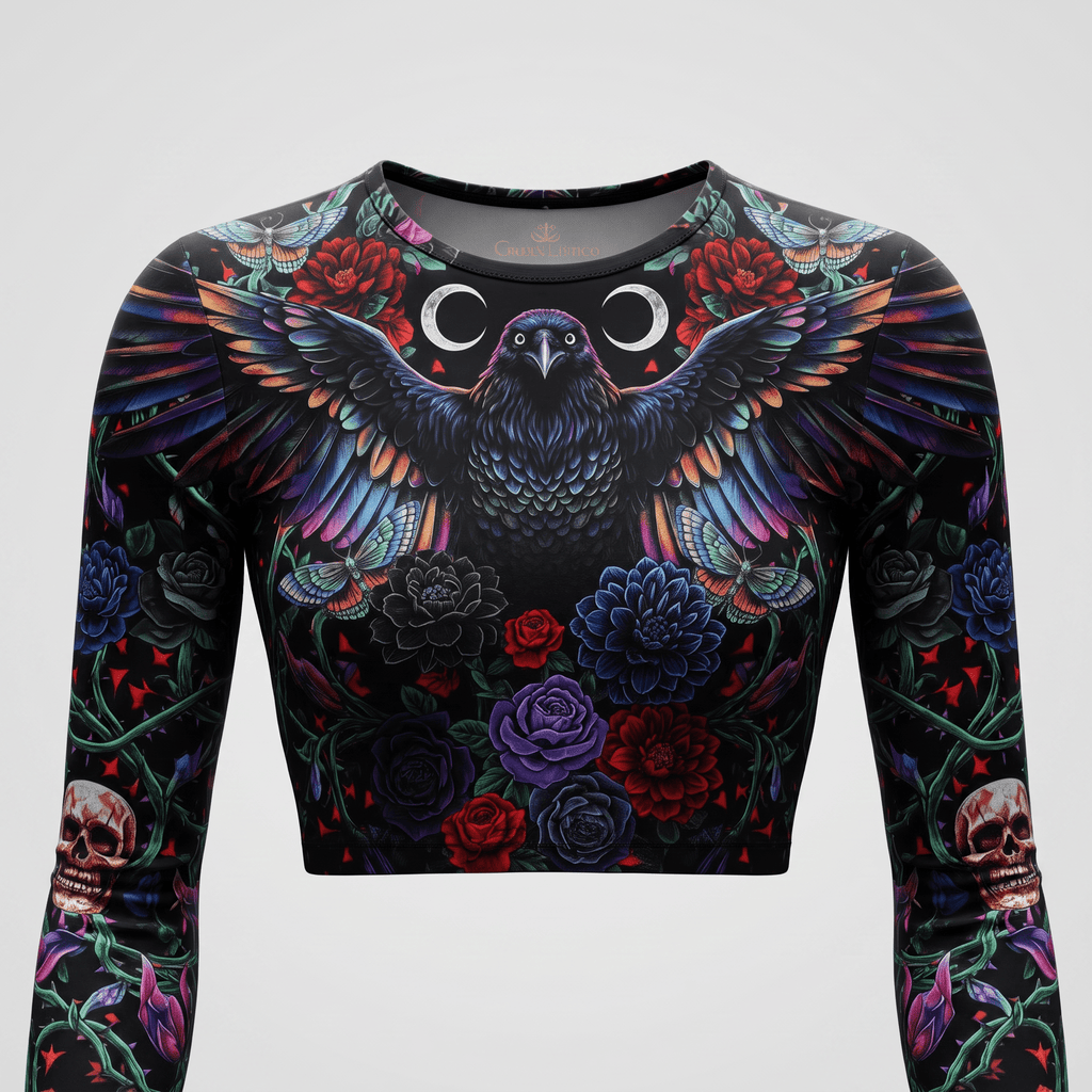 Black long-sleeve crop top with raven, floral, skull, and moon graphic print.
