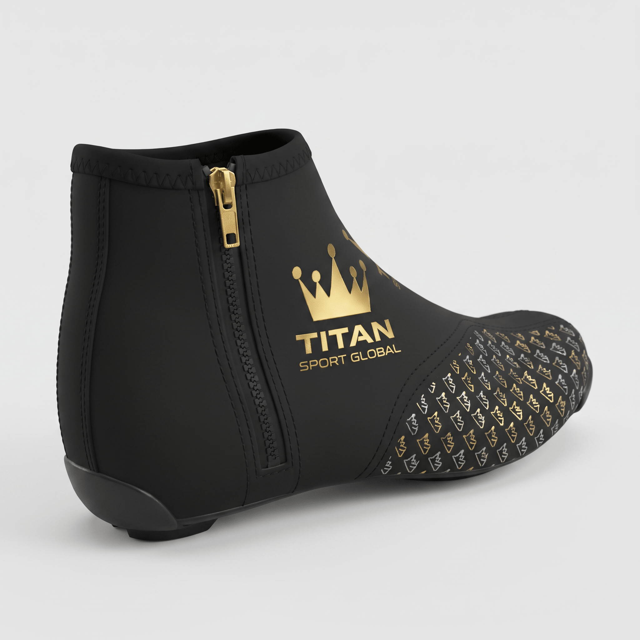 Black cycling shoe cover with gold Titan Sport Global logo, side zipper, and crown pattern on the toe.