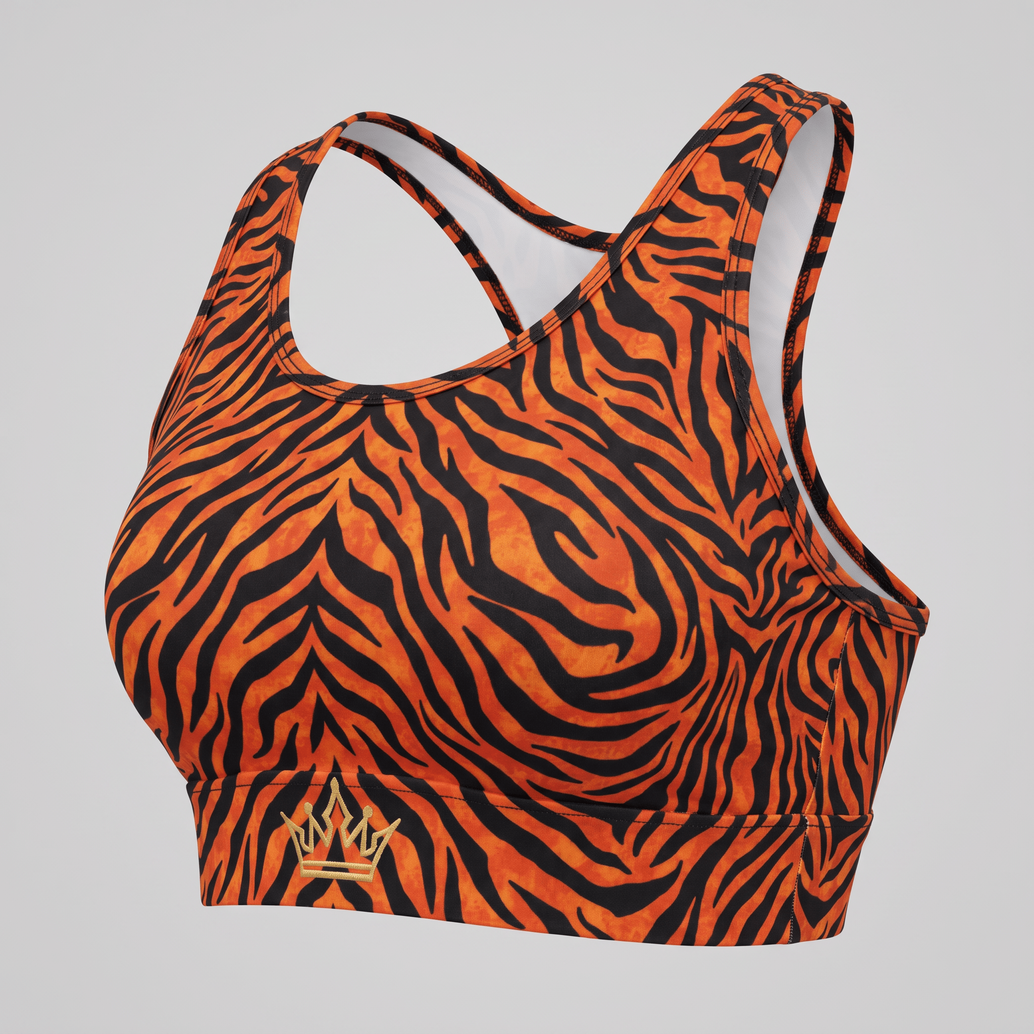Orange and black tiger stripe sports bra with racerback and gold crown logo on the underband.