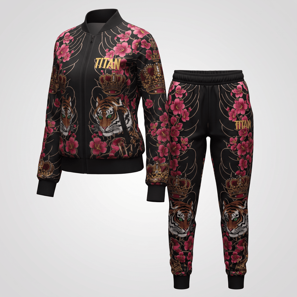 Black bomber jacket and joggers set featuring a pink cherry blossom, tiger, and crown print with gold Titan text.