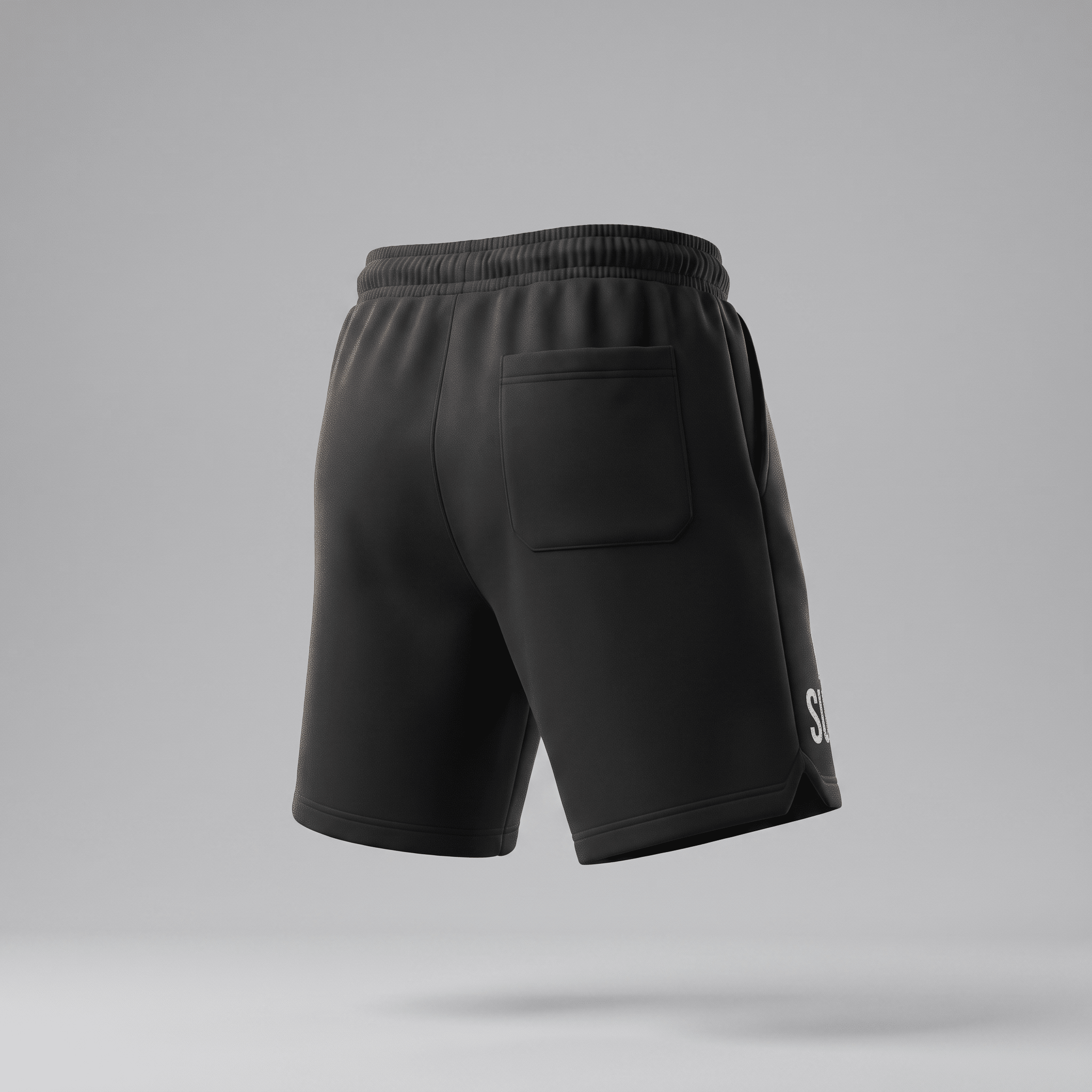 Rear view of black athletic shorts with an elastic waistband, back pocket, and side leg text on a grey background.