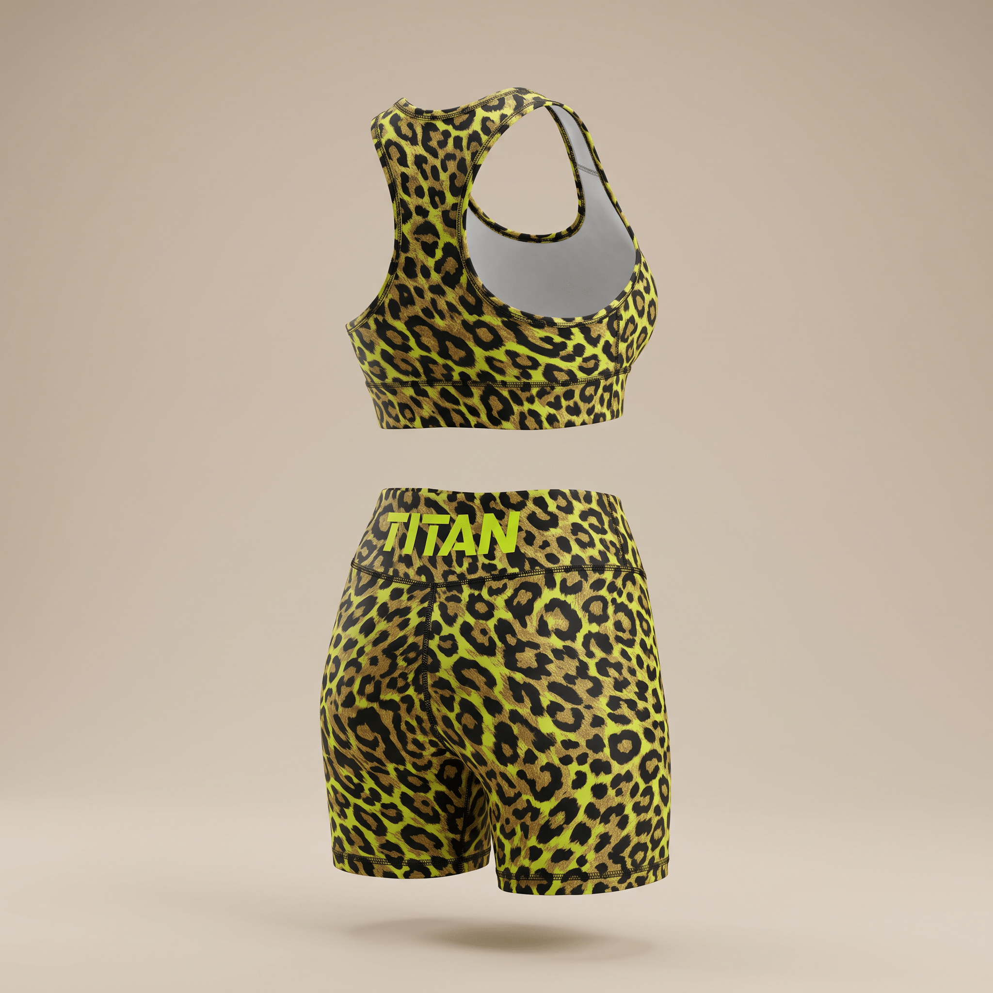 Yellow and black leopard print sports bra and biker shorts set with Titan logo on the back waistband.
