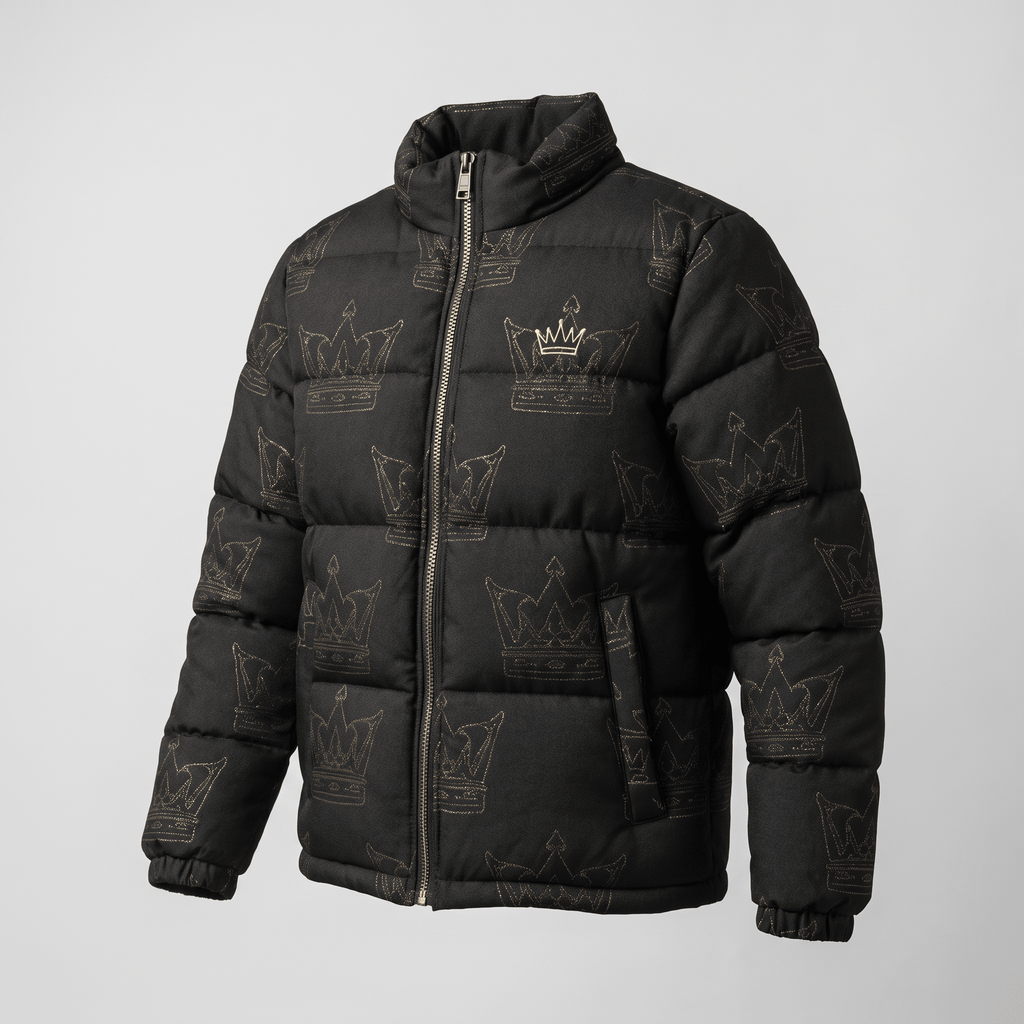 Black puffer jacket with an all-over gold crown print, stand collar, and full zip front.